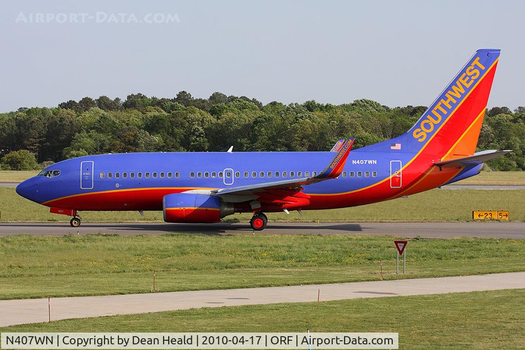 N407WN, 2001 Boeing 737-7H4 C/N 29817, Southwest Airlines N407WN (FLT SWA2388) taxiing to RWY 23 via Taxiway Charlie for departure to Tampa Int'l (KTPA).