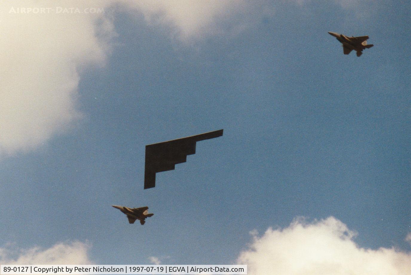 89-0127, 1989 Northrop Grumman B-2A Spirit C/N 1012/AV-12, Flanked by two escorting F-15C Eagles, this B-2A Spirit named Spirit of Kansas, callsign Spirit 50, arrived at the 1997 Intnl Air Tattoo at RAF Fairford.