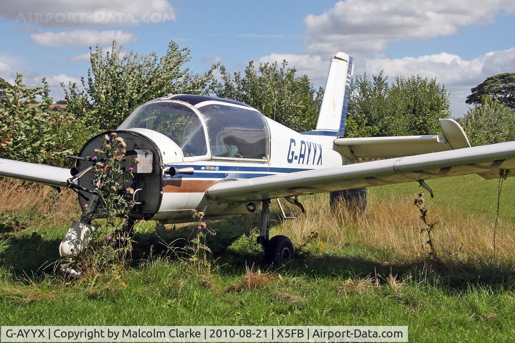 G-AYYX, 1971 Socata MS-880B Rallye Club C/N 1812, Socata MS-880B Rallye Club, sans engine and instruments, lies in a corner of Fishburn Airfield, August 2010.