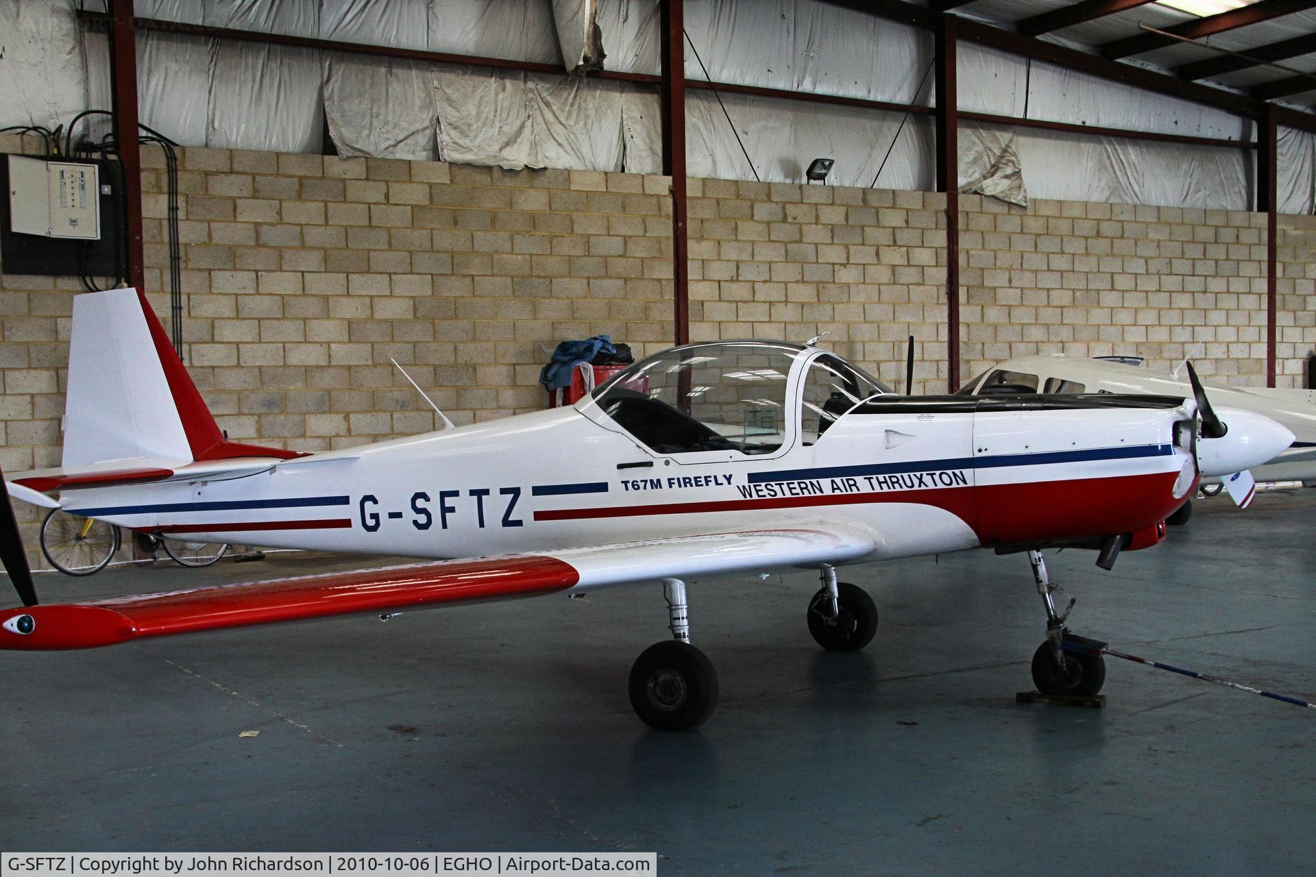 G-SFTZ, 1983 Slingsby T-67M Firefly C/N 2000, In Hangar at Thruxton