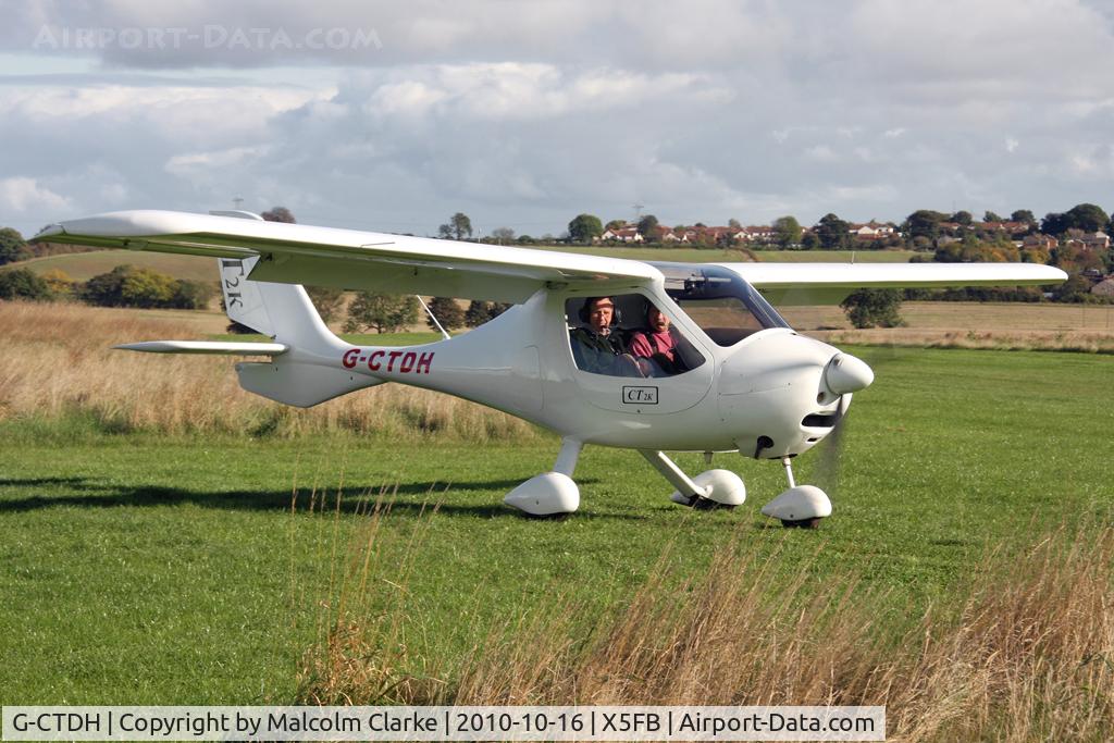 G-CTDH, 2003 Flight Design CT2K C/N 7939, Flight Design CT2K awaiting clearance to enter the active at Fishburn Airfield, October 2010.