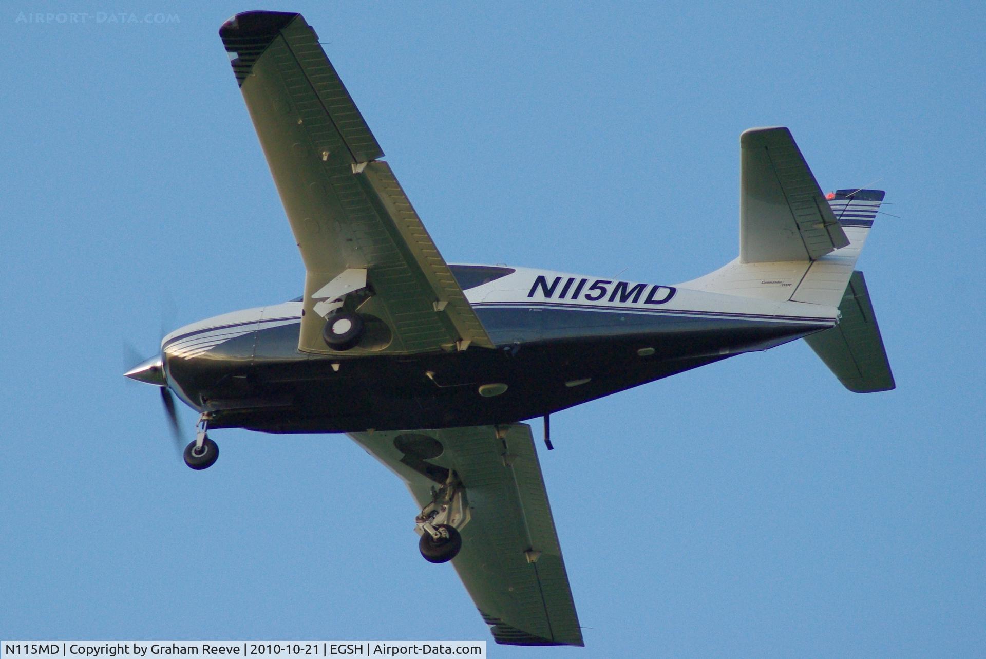 N115MD, 2001 Rockwell Commander 114TC C/N 20039, Over flying Norwich.
