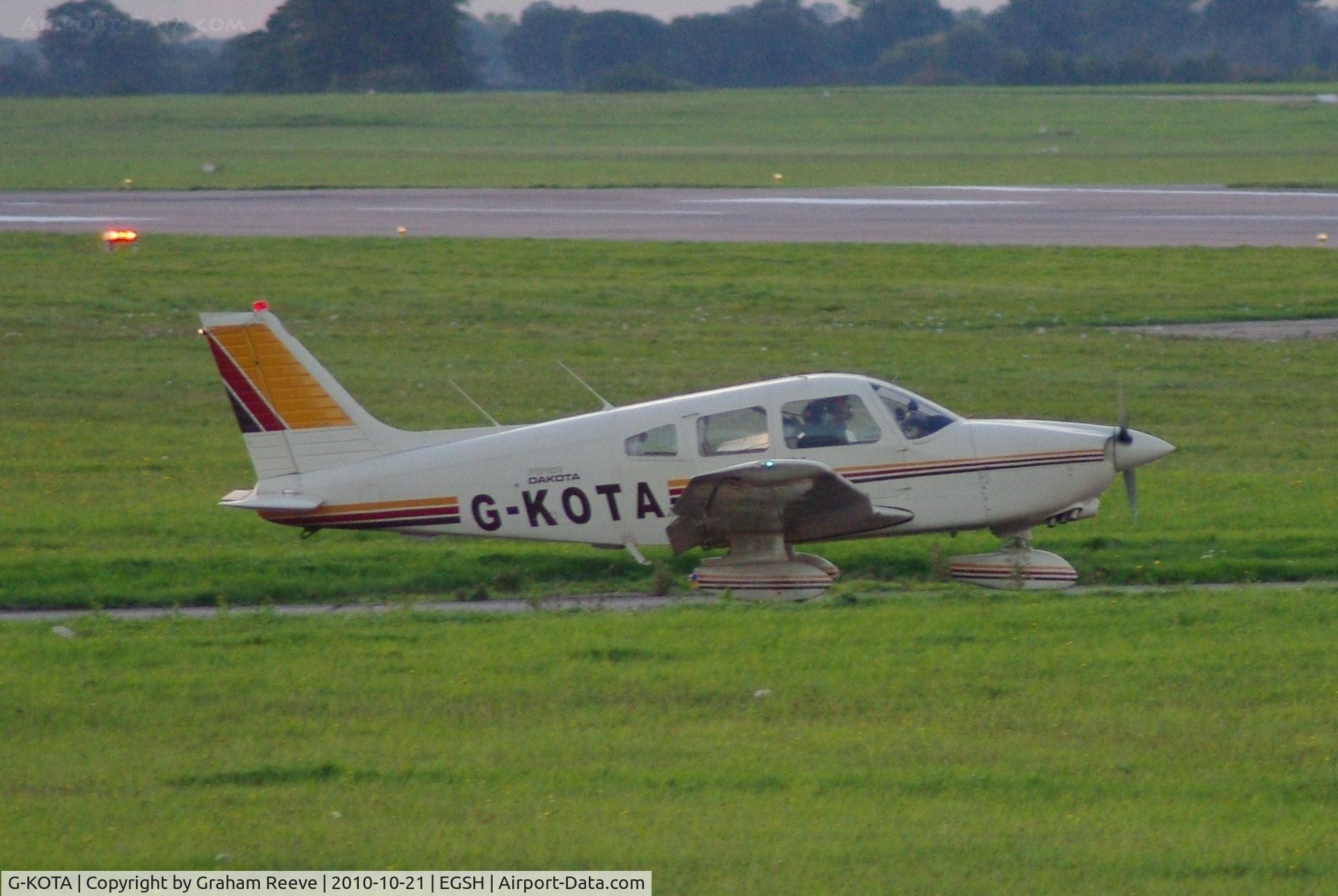 G-KOTA, 1980 Piper PA-28-236 Dakota C/N 28-8011044, About to depart.