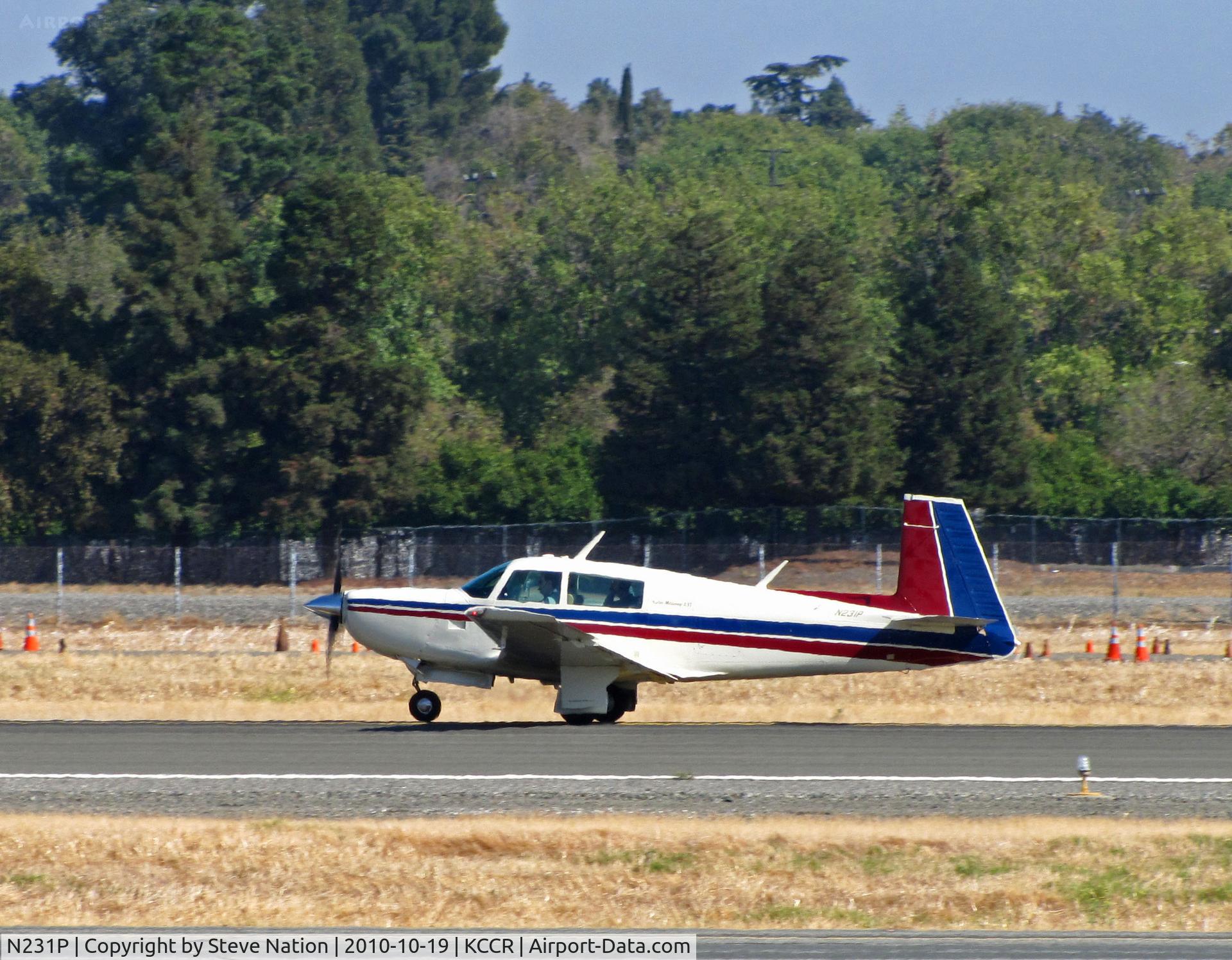 N231P, 1979 Mooney M20K C/N 25-0066, 1979 Mooney M20K taking-off from Buchanan Field home base