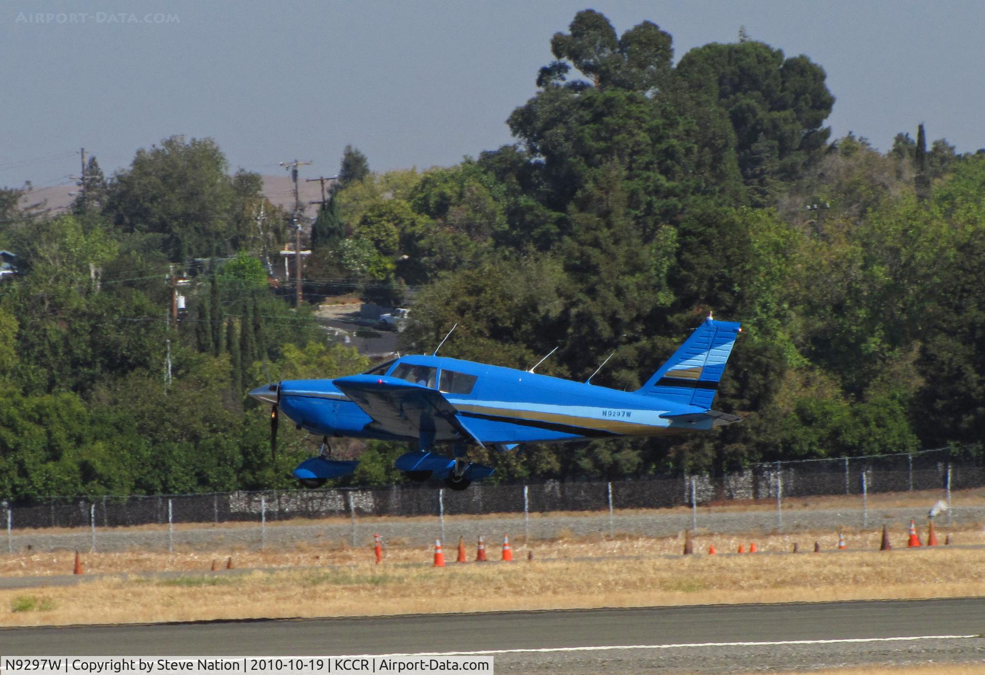 N9297W, 1967 Piper PA-28-235 C/N 28-10974, 1967 PA-28-235 ready to land on RWY 32R at Buchanan Field home base