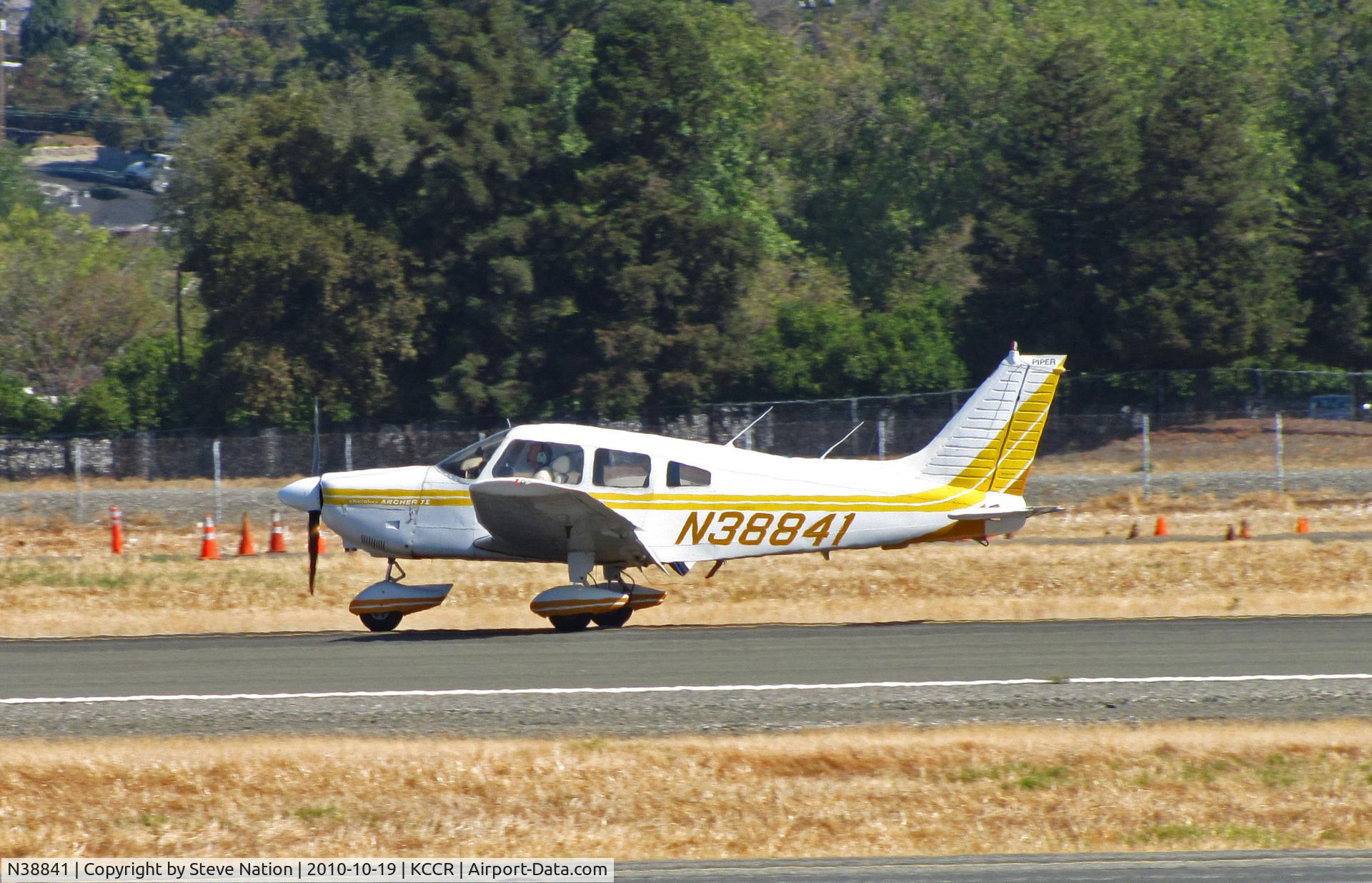 N38841, 1977 Piper PA-28-181 C/N 28-7790596, 1977 Piper PA-28-181 landing on RWY 32R @ Buchanan Field home base