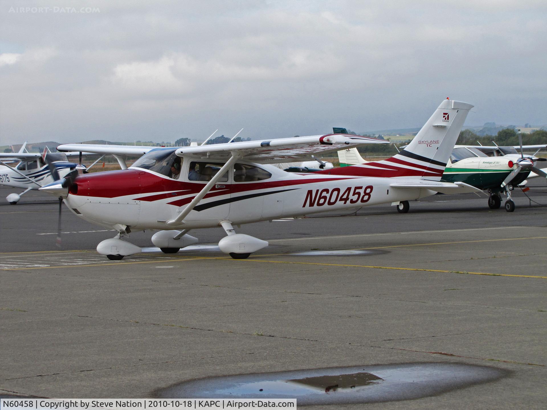 N60458, 2006 Cessna T182T Turbo Skylane C/N T18208574, 2006 Cessna T182T taxis on visitors ramp @ Napa, CA for flight home to KMYF (Montgomery Field/San Diego, CA)