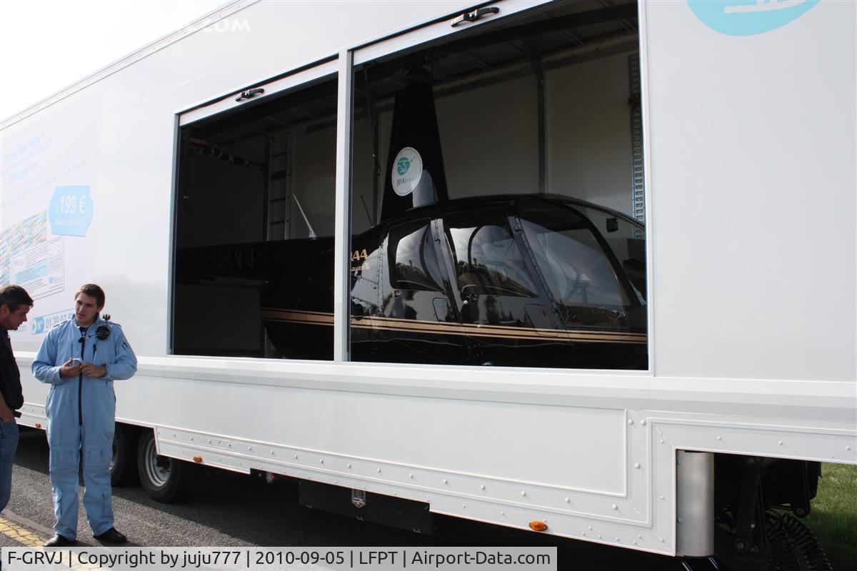 F-GRVJ, 2007 Robinson R44 Raven II C/N 11644, on display at Pontoise on trailer truck