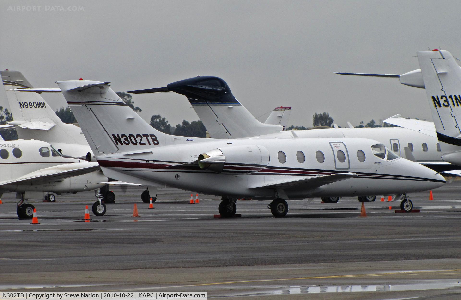 N302TB, 2004 Raytheon Aircraft Company 400A C/N RK-384, Moser Farms (Casper, WY) 2004 Raytheon 400A on Bizjet ramp @ Napa, CA