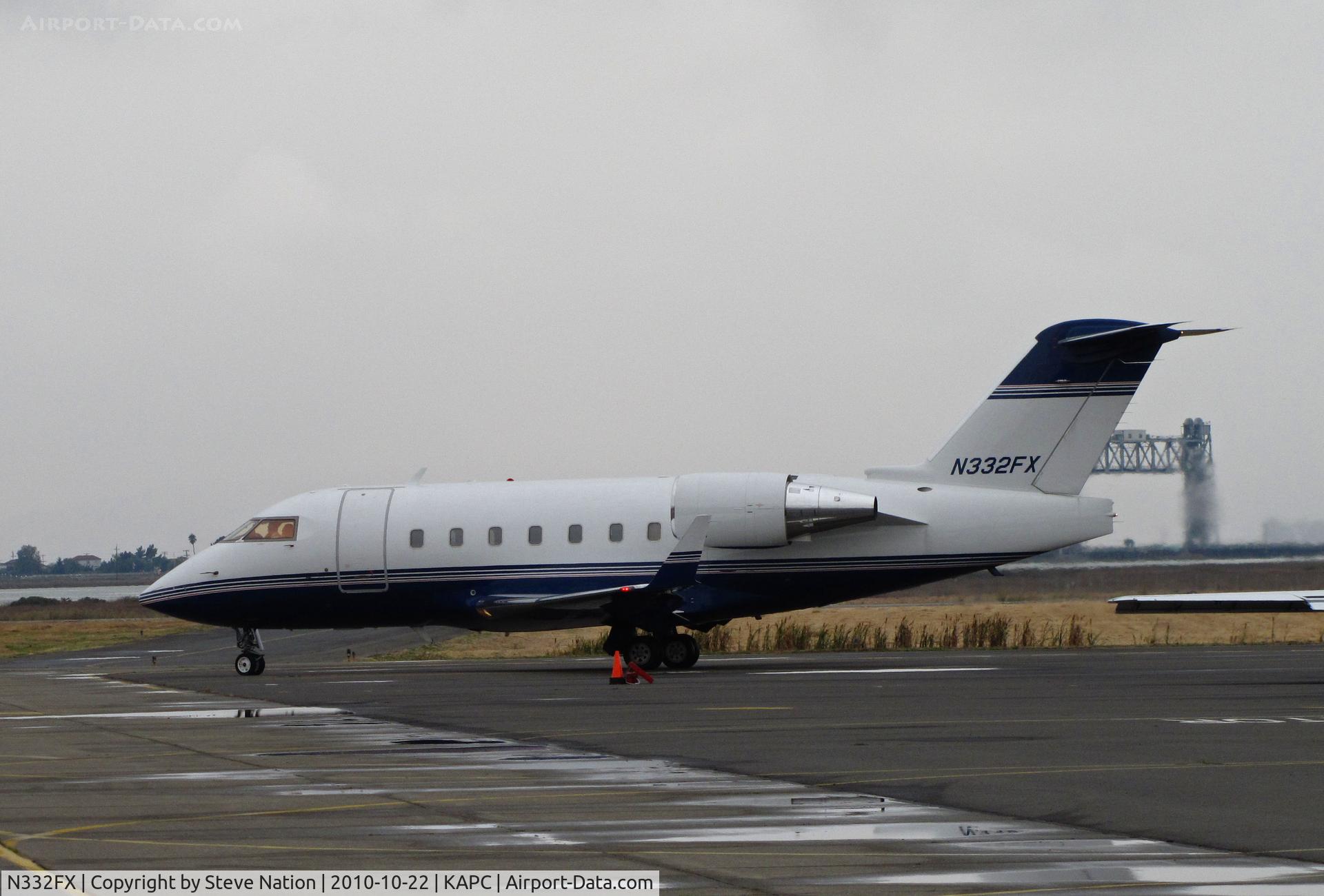 N332FX, 2002 Bombardier Challenger 604 (CL-600-2B16) C/N 5543, FlexJets 2002 CL-600-2B16 taxis for take-off for CYVR (Vancouver International Airport, British Columbia) as 