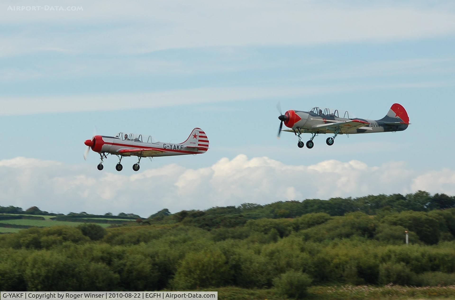 G-YAKF, 1991 Yakovlev (Aerostar) Yak-52 C/N 9111205, Formation take off with G-BVVA