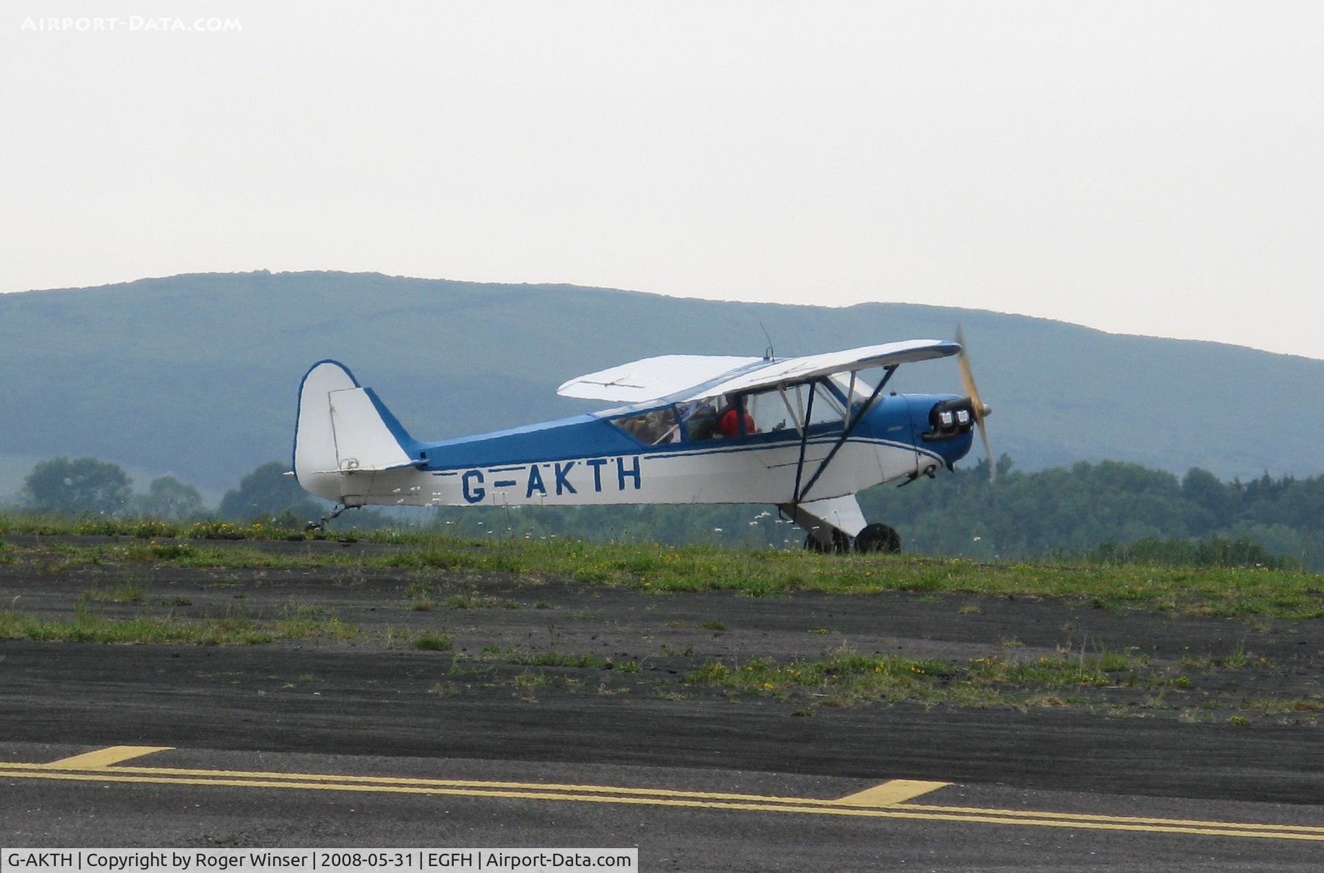 G-AKTH, 1945 Piper L-4J Grasshopper (J3C-65D) C/N 13047, Piper Cub taxying to depart after a brief visit