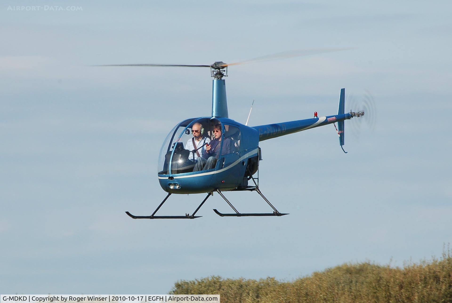 G-MDKD, 1990 Robinson R22 Beta C/N 1247, Resident R-22 helicopter operated by Heli-air Wales.