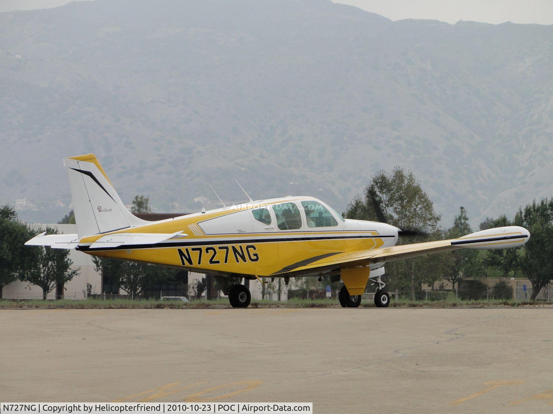 N727NG, 1963 Beech 35-B33 Debonair C/N CD-689, Standing by runway 26L waiting permission to take off