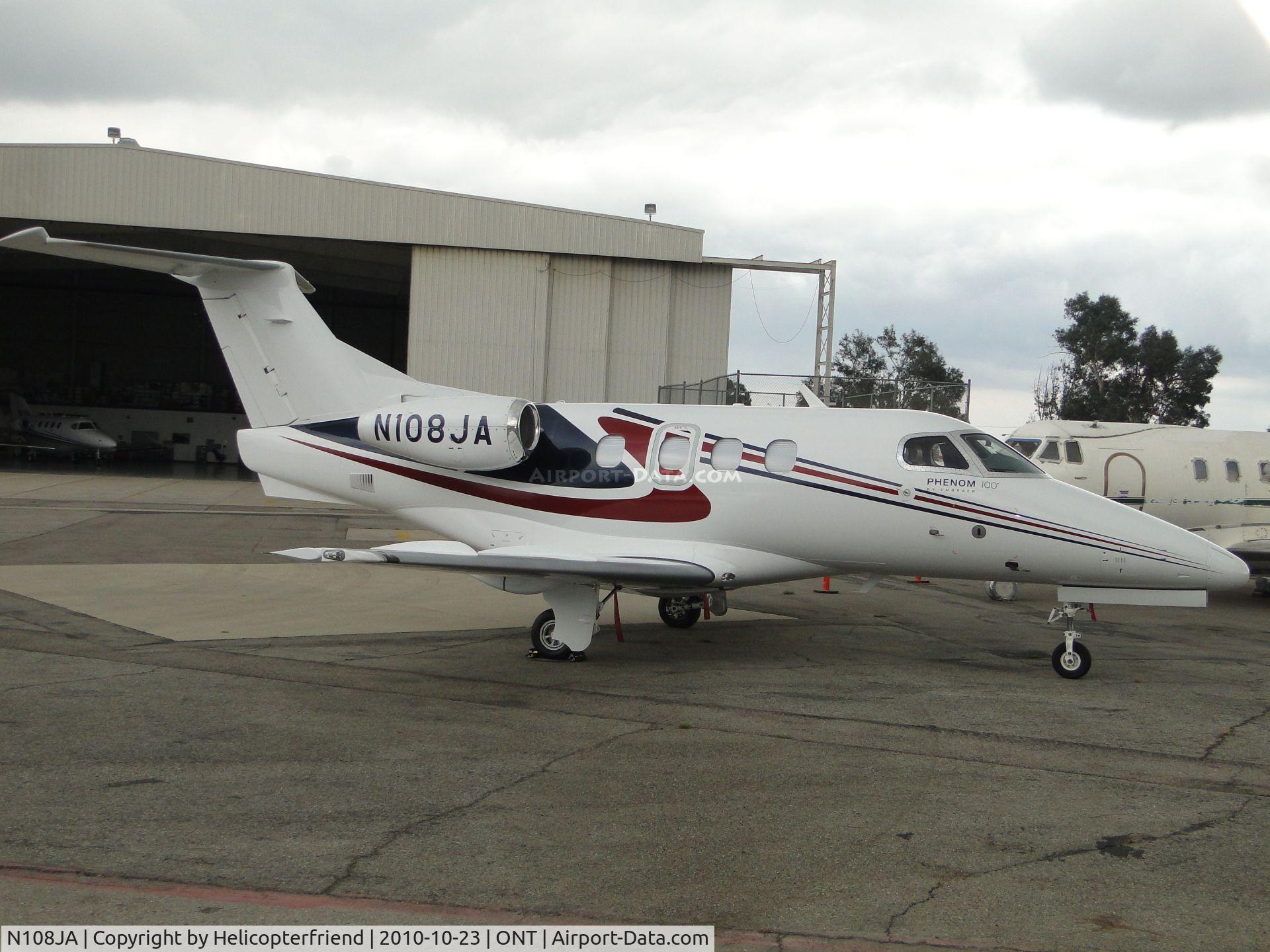 N108JA, 2009 Embraer EMB-500 Phenom 100 C/N 50000023, Waiting it's turn to be put into the hanger