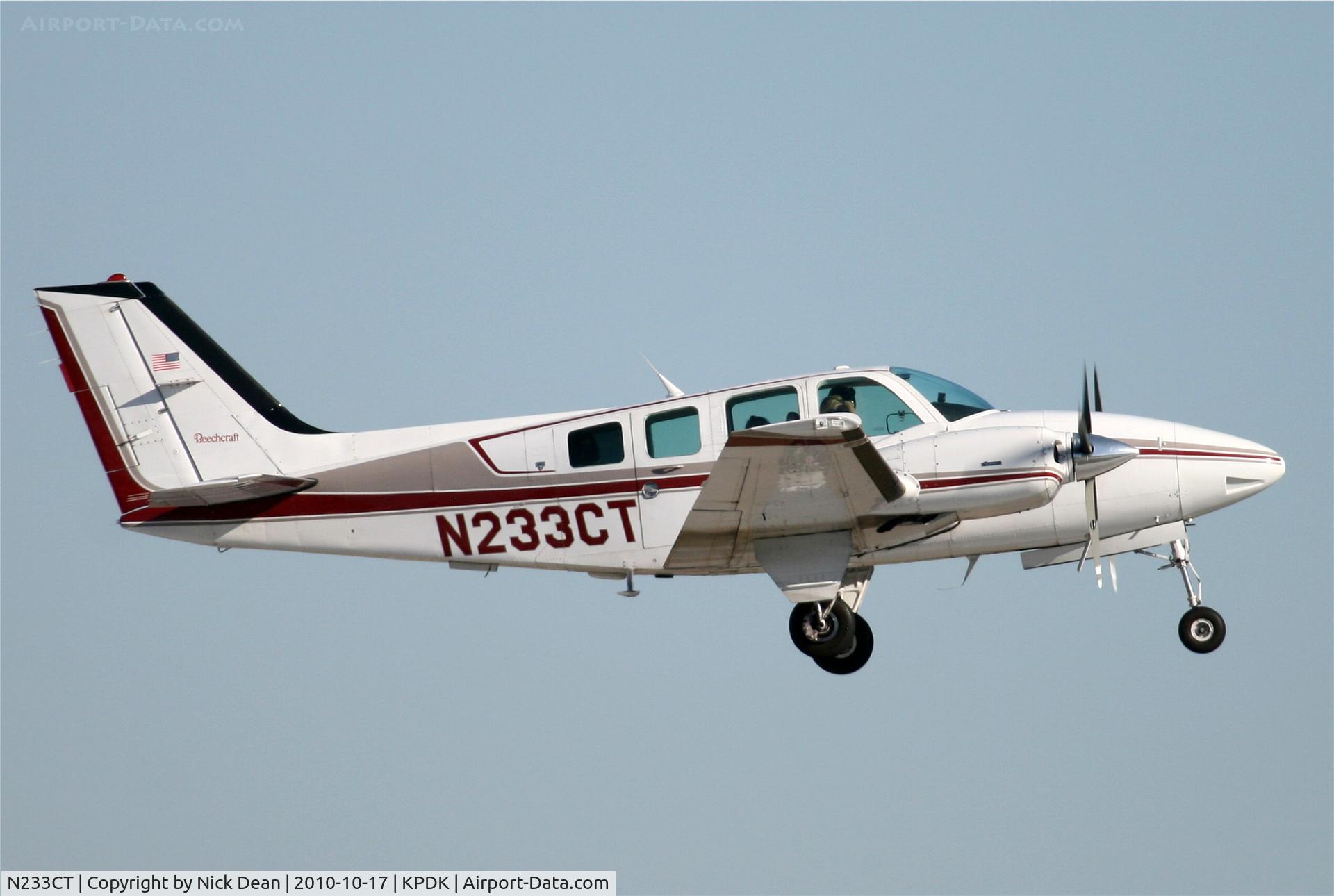 N233CT, 1984 Beech 58 Baron C/N TH-1433, KPDK NBAA 2010
