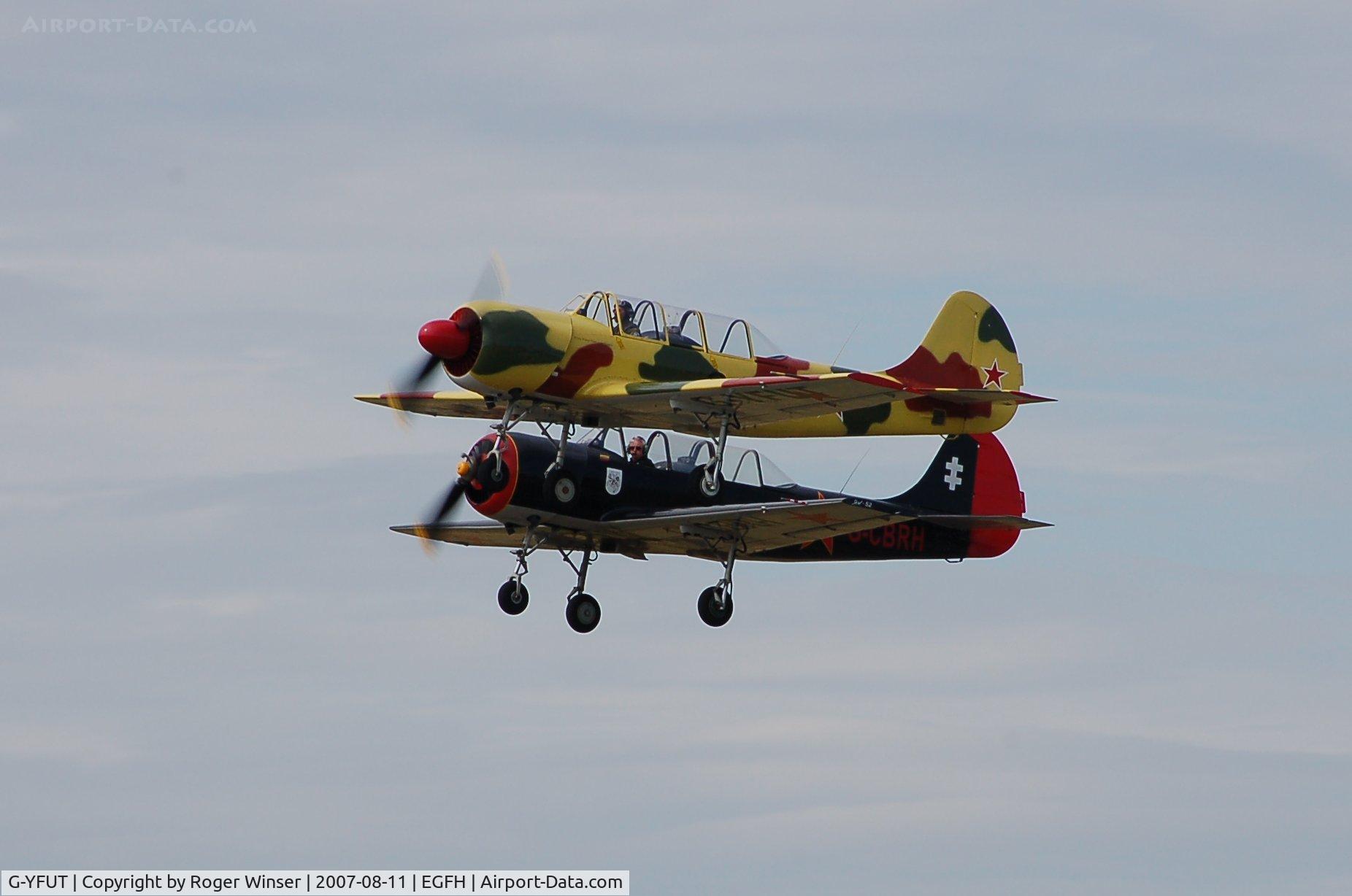 G-YFUT, 1988 Bacau Yak-52 C/N 888410, Formation take off with G-CBRH