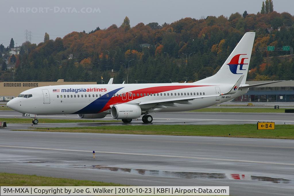9M-MXA, 2010 Boeing 737-8H6 C/N 40128, New color scheme seen displayed on this 737-8H6 for Malaysia Airlines.