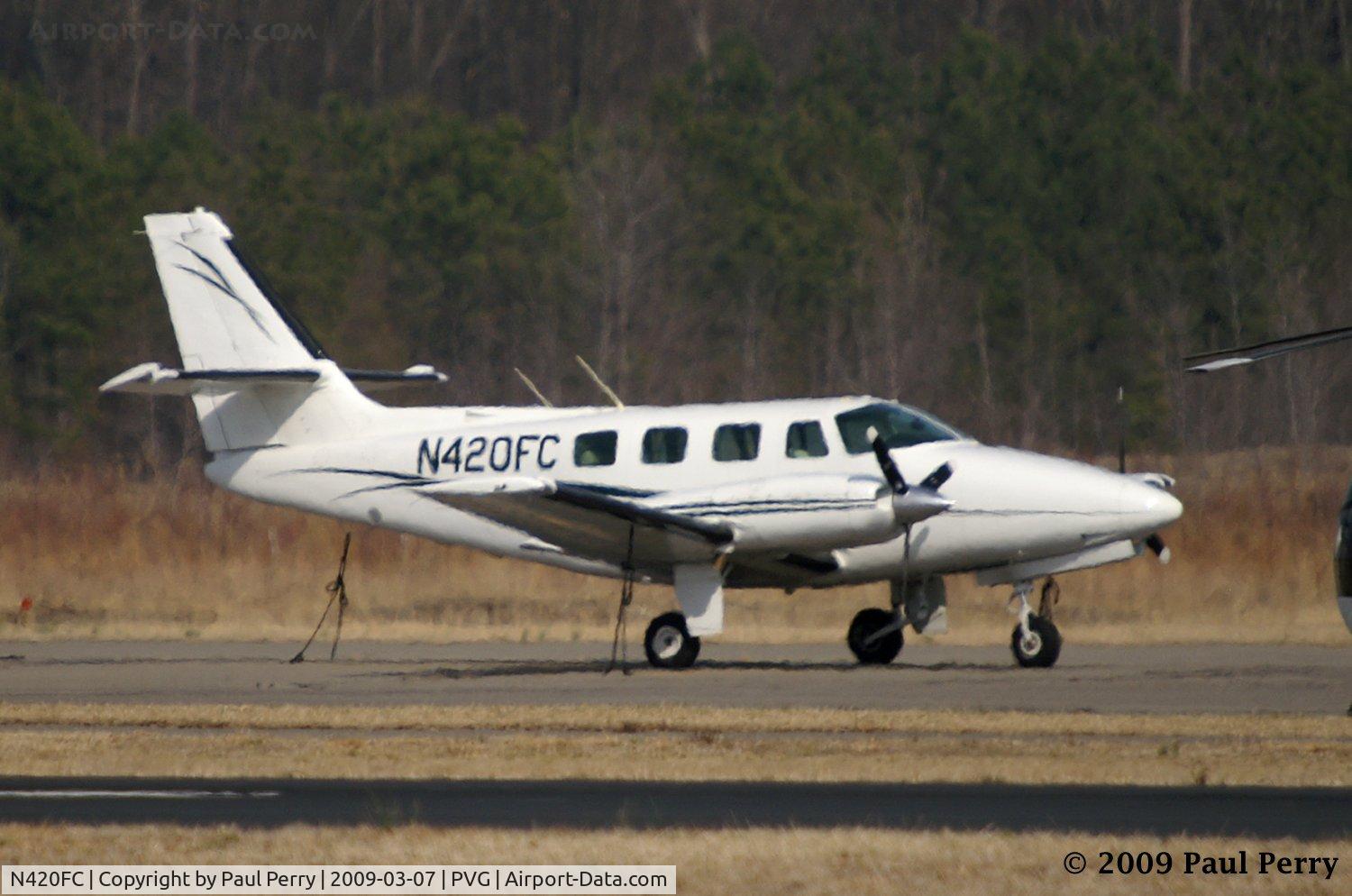 N420FC, 1982 Cessna T303 Crusader C/N T30300136, Seen across the field