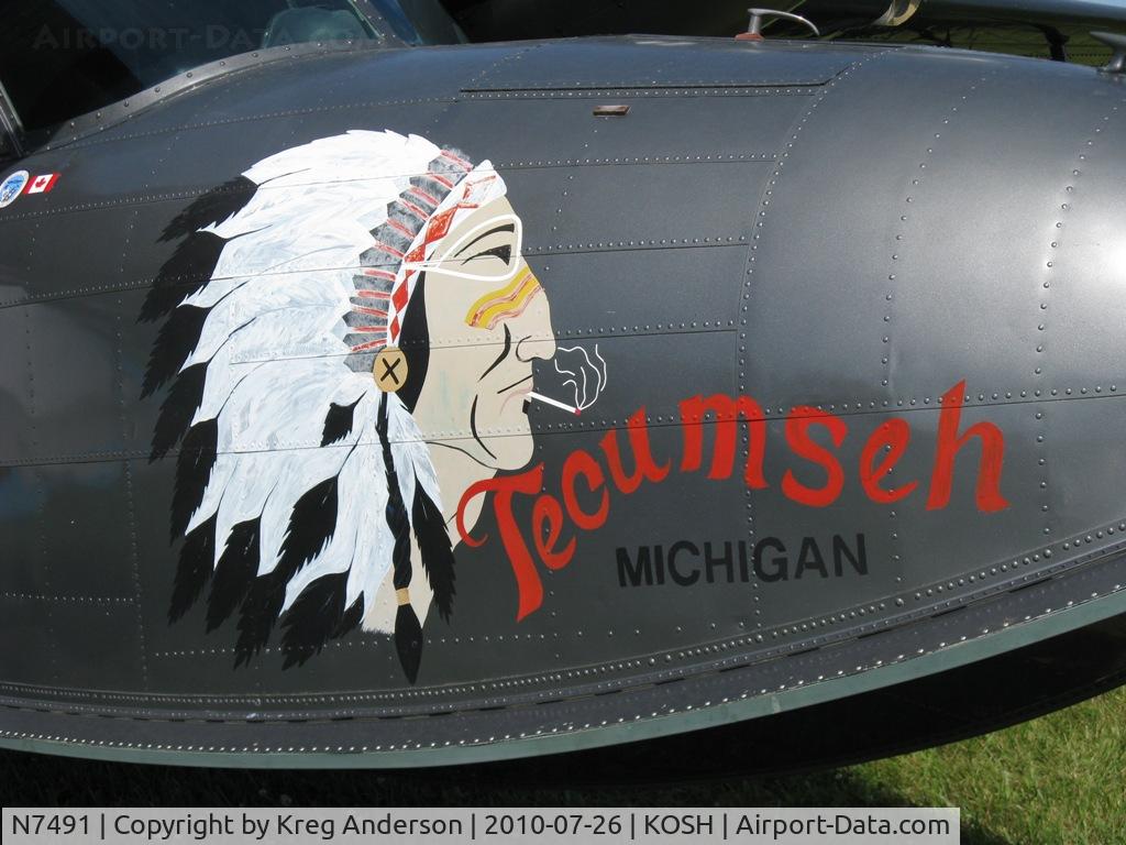 N7491, 1942 Grumman G-44 Widgeon C/N 1240, EAA AirVenture 2010. Up close view of the artwork on the nose.