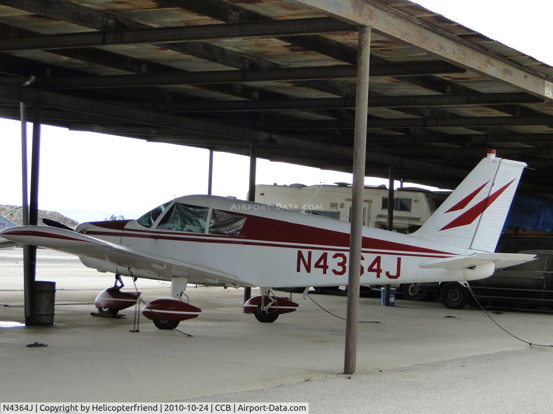 N4364J, 1967 Piper PA-28-140 C/N 28-22743, Tied down, shaded and parked under the canopy