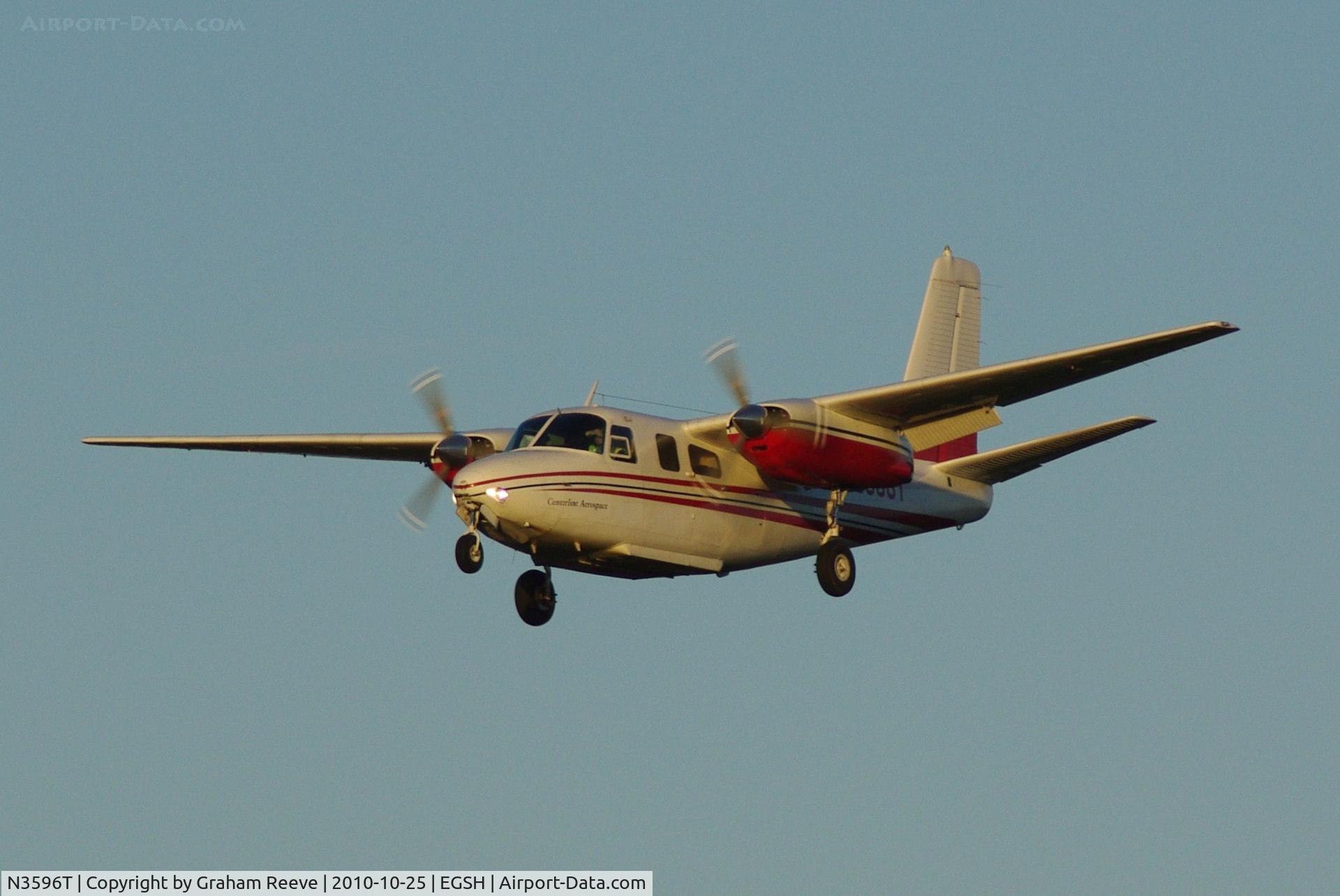 N3596T, 1959 Aero Commander 500 C/N 752, Landing in the late afternoon sun.