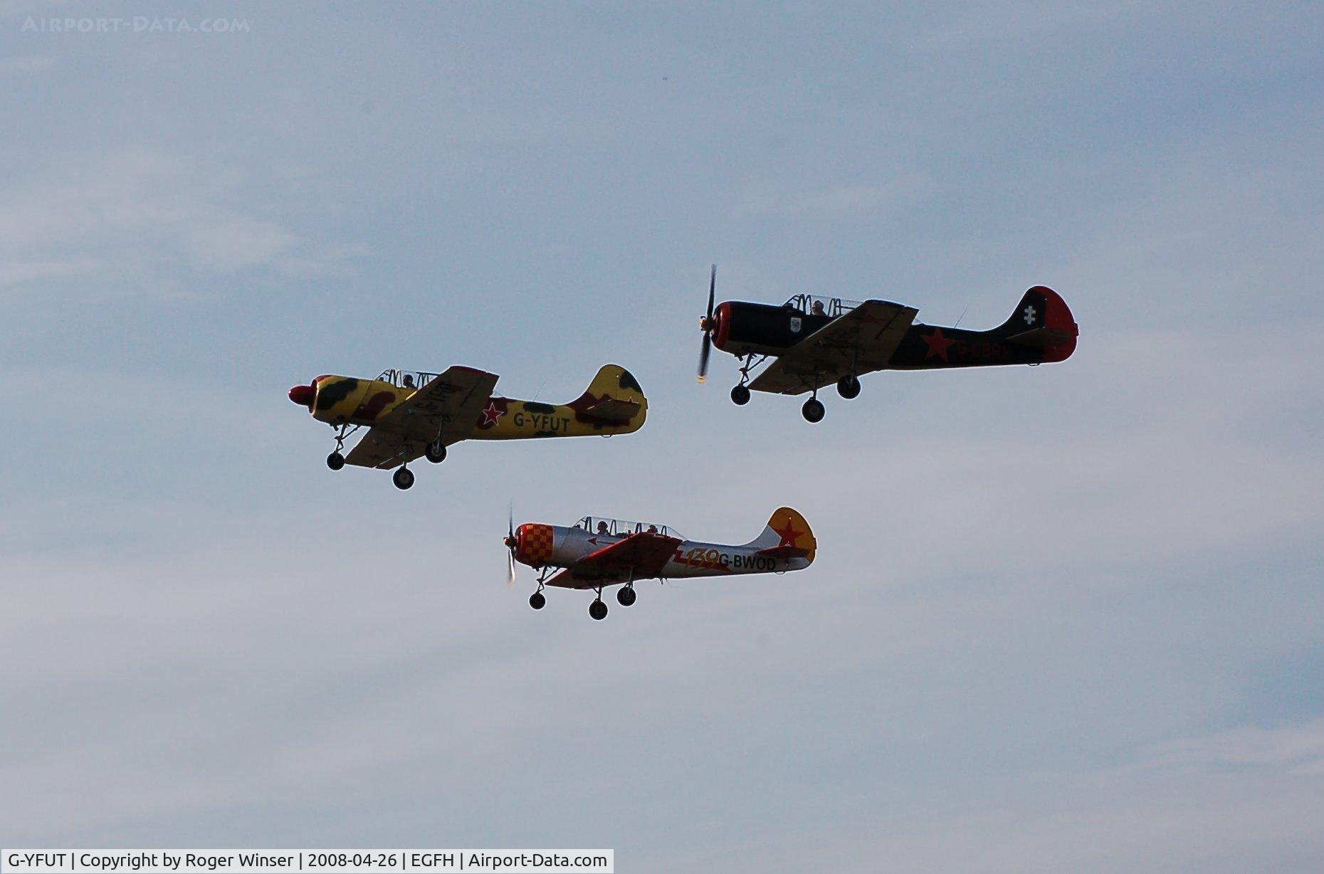 G-YFUT, 1988 Bacau Yak-52 C/N 888410, Formation take-off with G-BWOD and G-CBRH