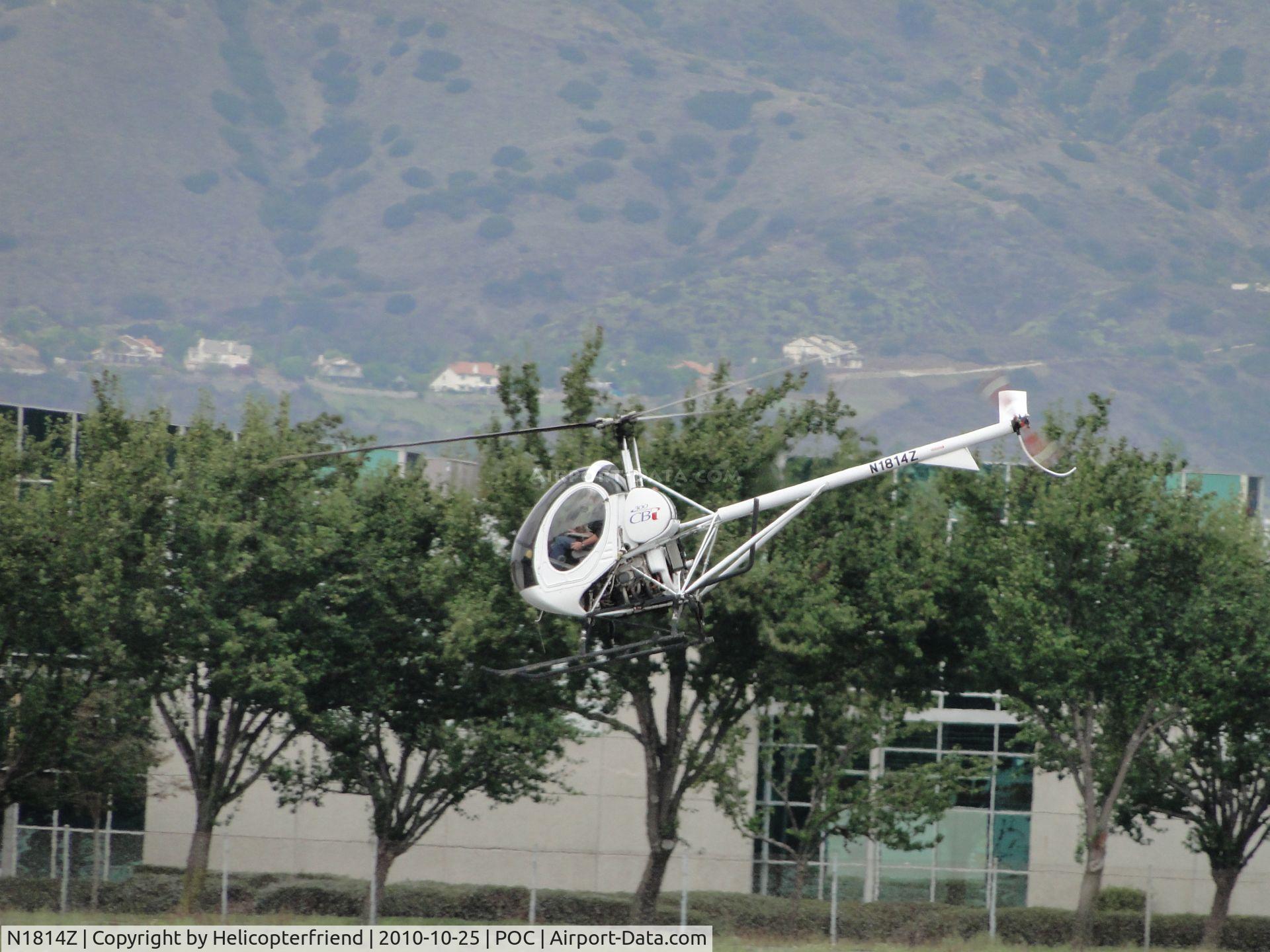 N1814Z, 2007 Schweizer 269C-1 C/N 0304, Nose down and taking off westbound