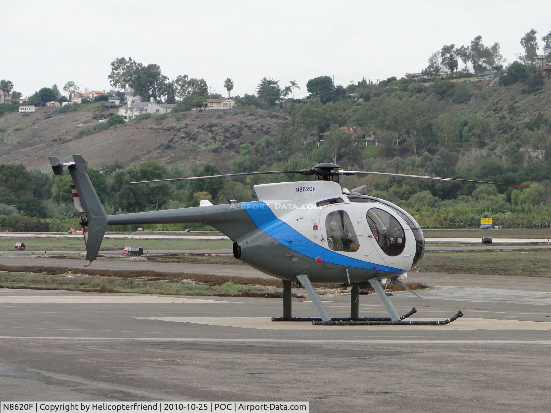 N8620F, 1977 Hughes 369D C/N 770160D, Parked on the southwest helipad south of where the work on taxiway Sierra is being done
