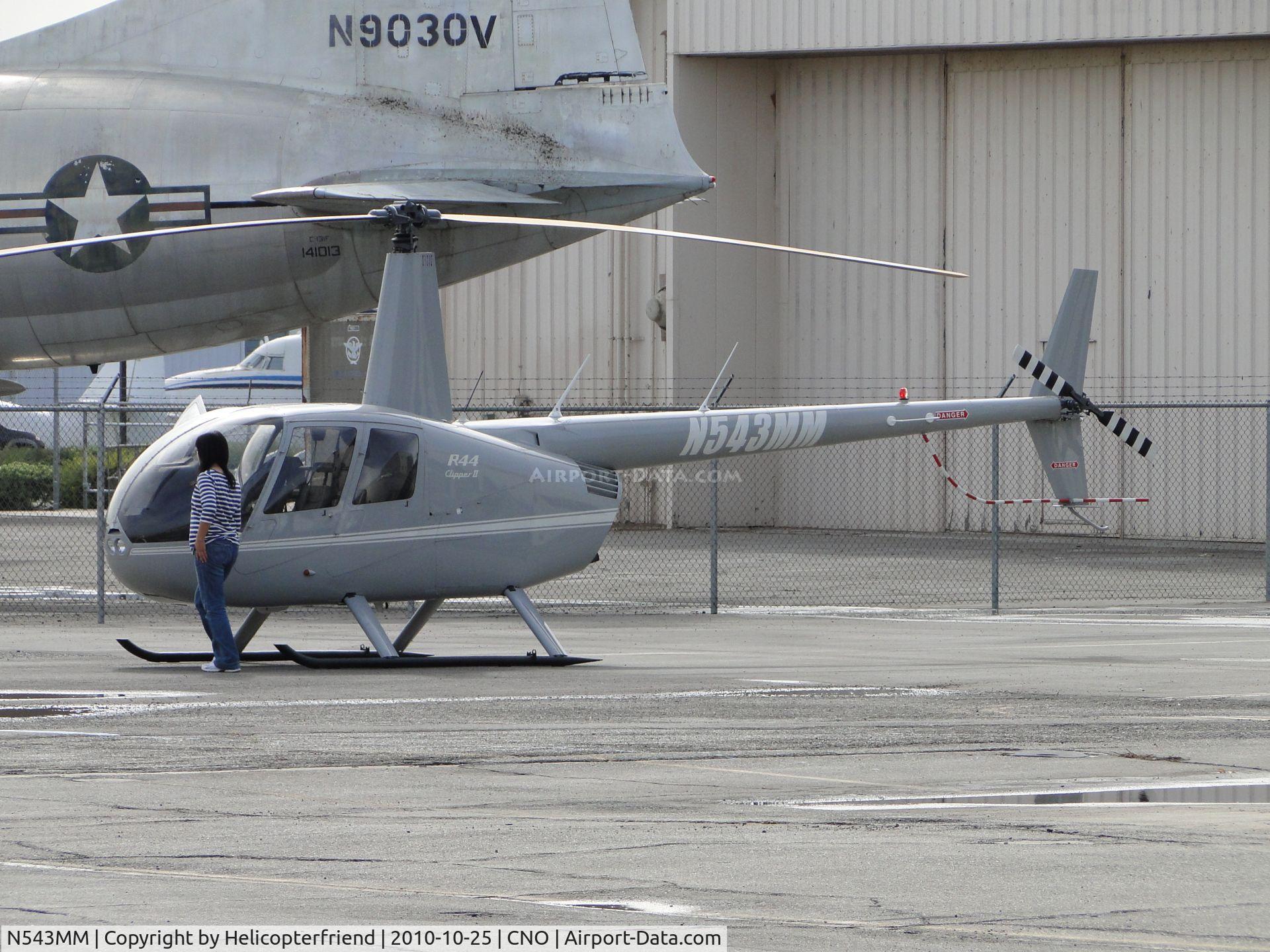 N543MM, Robinson R44 II C/N 12726, New registration number for old number 543HK. Loading up passengers at Chino