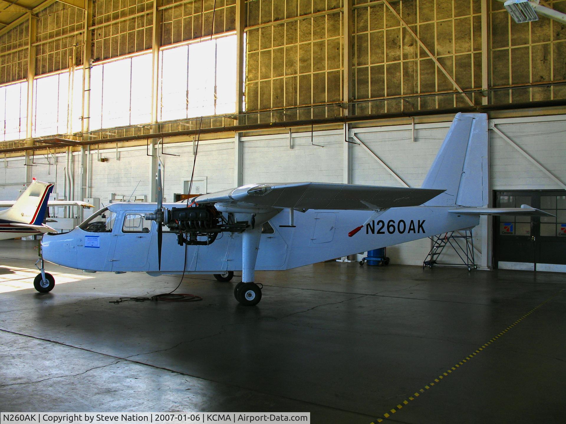 N260AK, 1969 Britten-Norman BN-2A Islander C/N 97, Ethereral hangar shot of Locally-based all white 1969 BN-2A owned by Channel Islands Aviation/CIA with nose cone removed and cowling covers missing (sold to operator in Panama in Jan 2009)