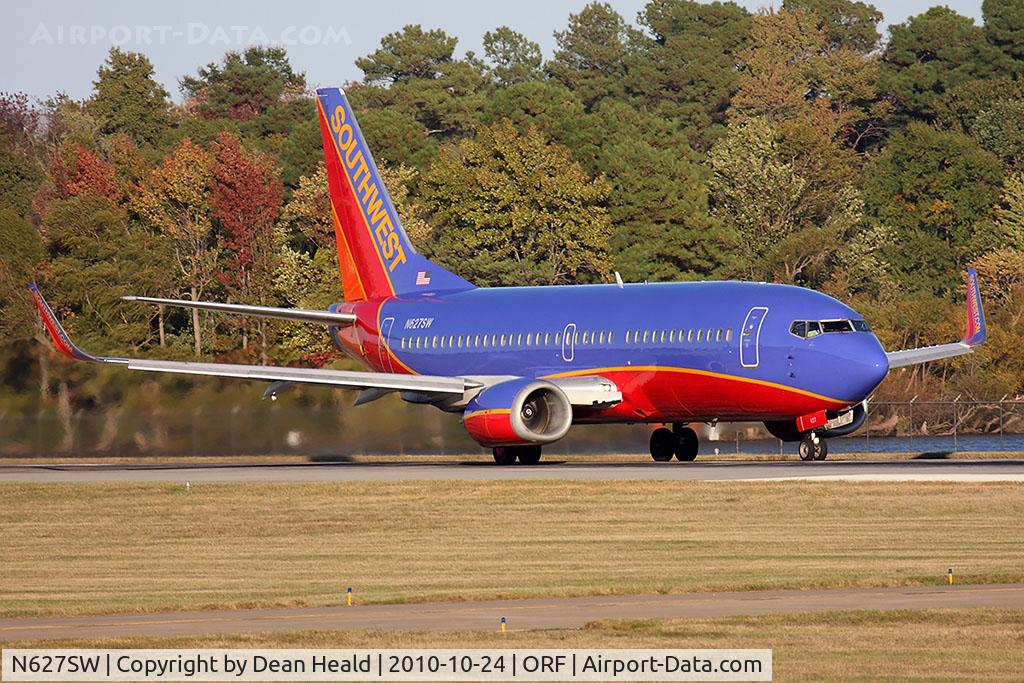 N627SW, 1996 Boeing 737-3H4 C/N 27935, Southwest Airlines N627SW (FLT SWA889) starting takeoff roll on RWY 23 en route to Jacksonville Int'l (KJAX) with nice autumn colors in the trees in the background.