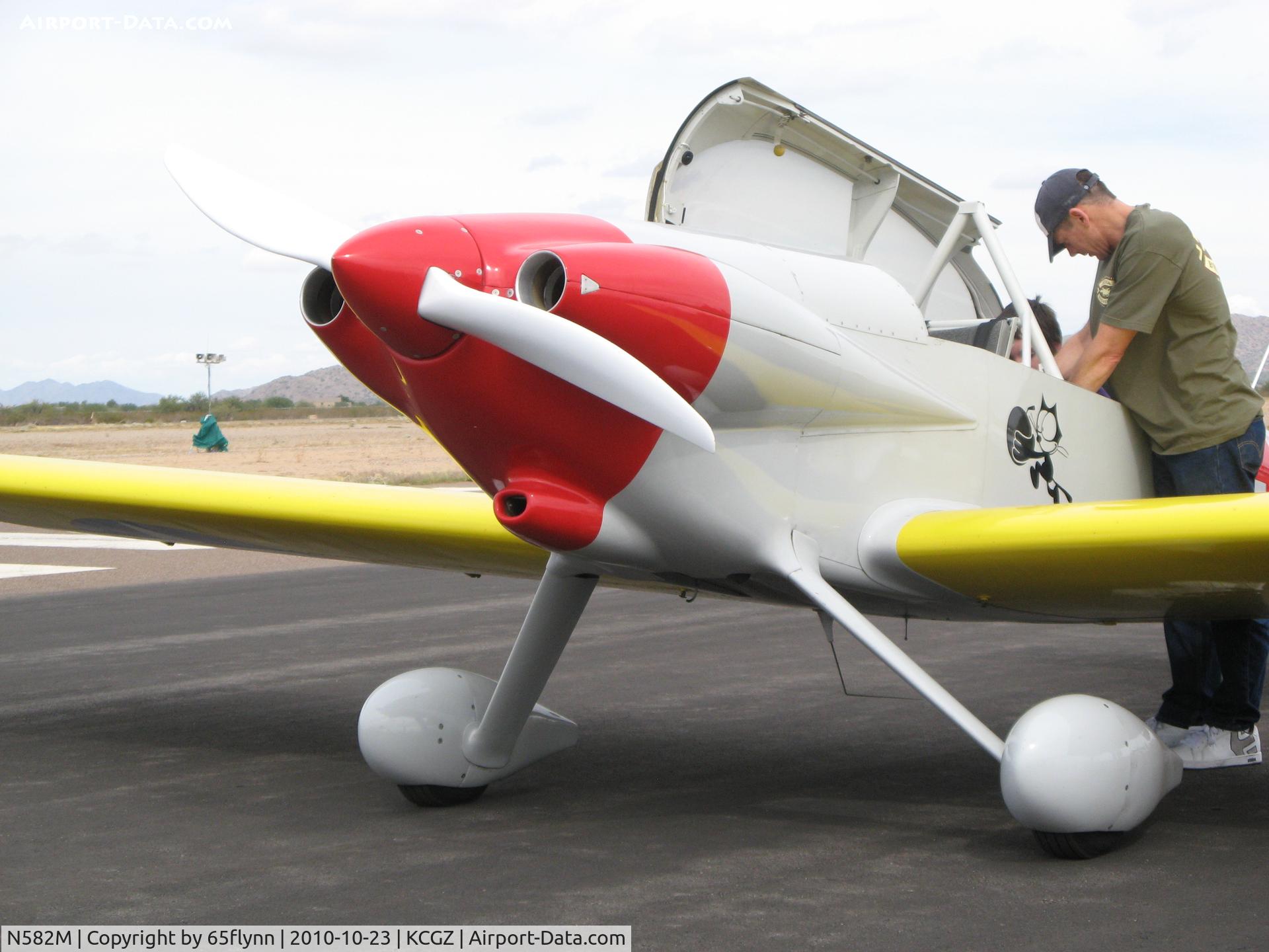 N582M, 1991 Vans RV-4 C/N 1608, Sleek looking RV-4 with a nice cowl.  I was disappointed to see the spinner wobble when the engine was started.  The owner needs to check it's run-out and possibly remount it.