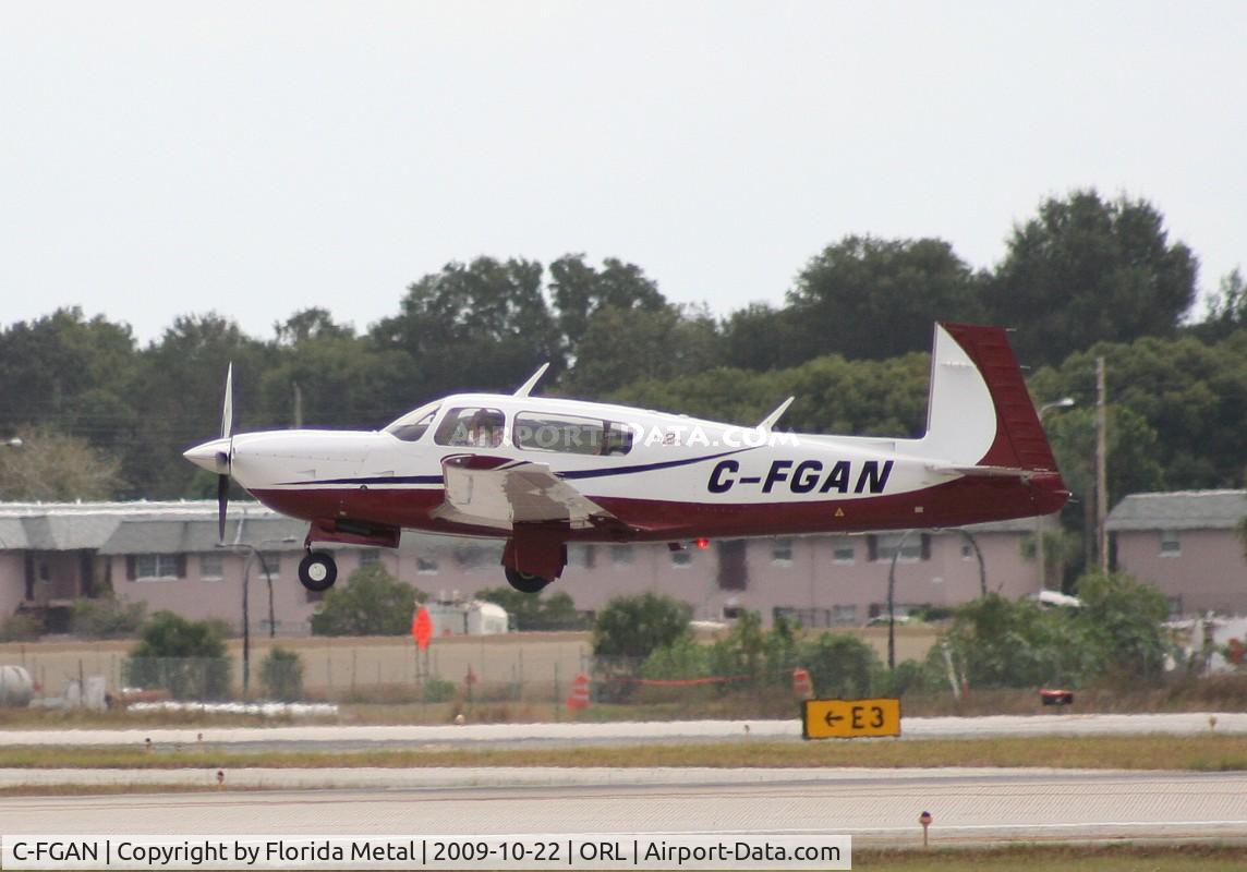 C-FGAN, 2005 Mooney M20R Ovation C/N 29-0374, I got it at NBAA in Orlando in 2009, Nick Dean has it at NBAA Atlanta this year.  Either way, this guy travels a long way from Canada to the NBAA events
