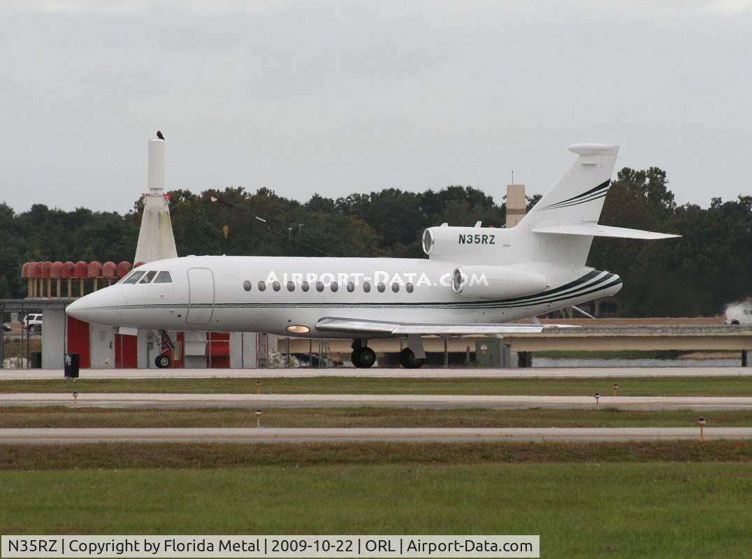 N35RZ, 1994 Dassault Falcon 900B C/N 137, Falcon 900 with a bald eagle sitting on the VOR