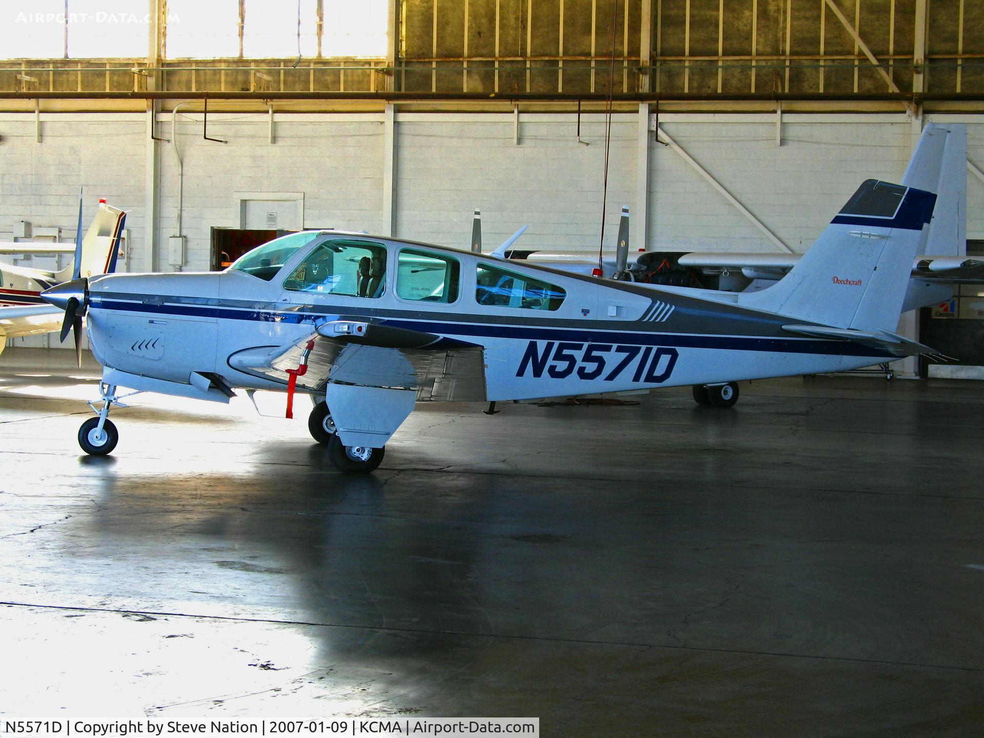 N5571D, 1989 Beech F33A Bonanza C/N CE-1405, Locally-based 1989 Beech F33A tucked away in hanger on sunny, balmy home ramp at Camarillo Airport in early Jan 2007 (moved to colder country - Minnesota - in Nov 2009)