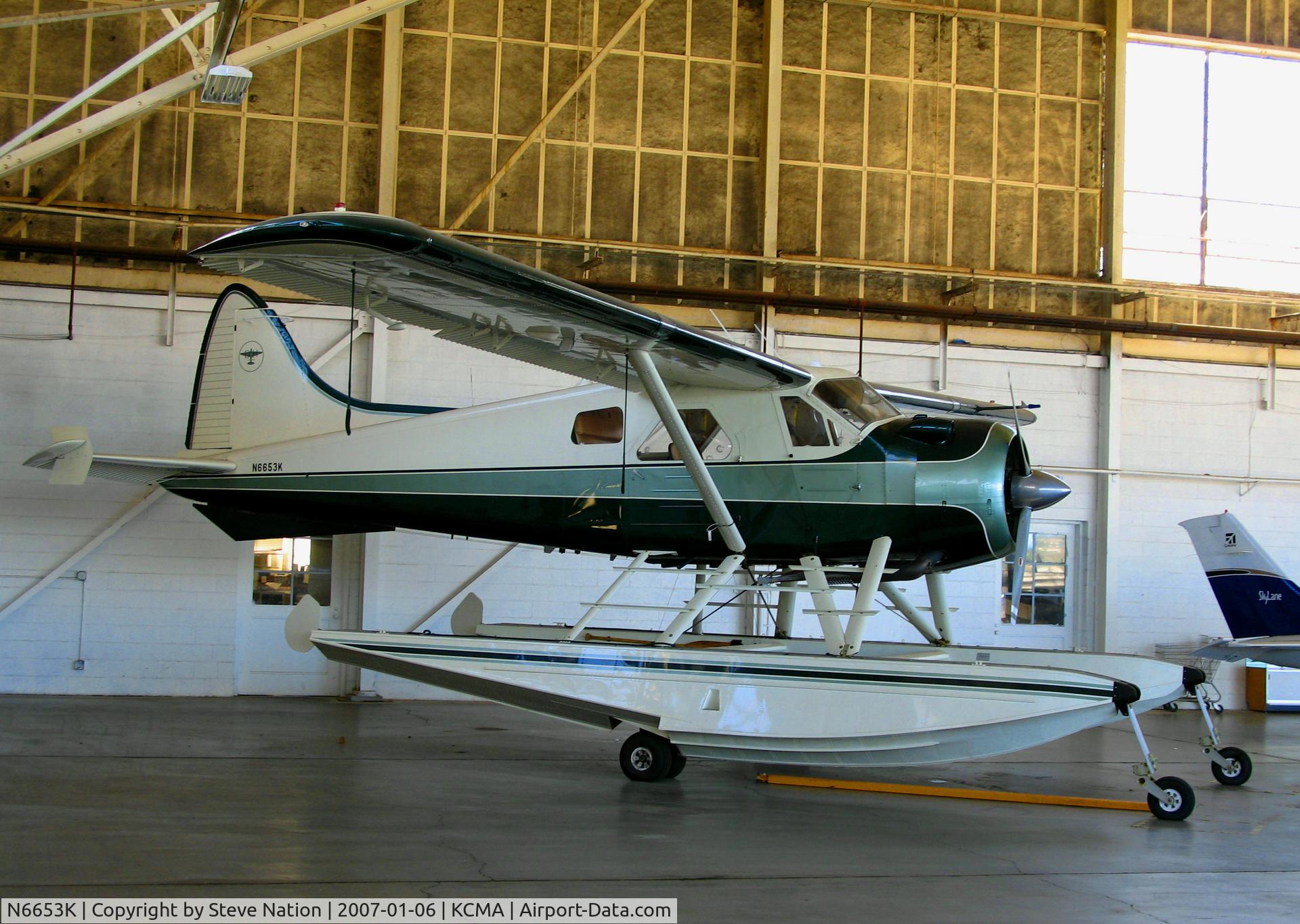 N6653K, 1953 De Havilland Canada DHC-2 MK. I(L20A) C/N 565, float-equipped 1953 DHC-2 in hanger at Camarillo Airport, CA on sunny, warm Jan day