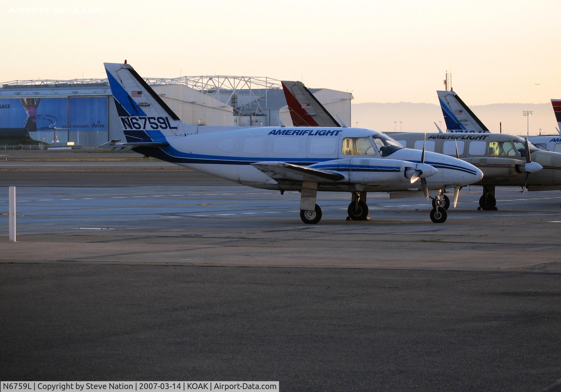 N6759L, 1970 Piper PA-31-310 Navajo C/N 31-661, Ameriflight 1970 PA-31-310 freighter on OAK North Ramp at sunset
