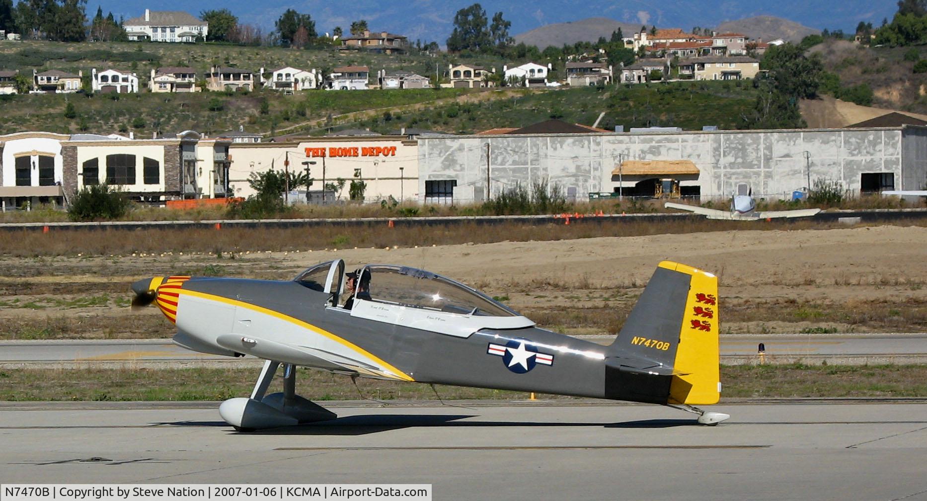 N7470B, Vans RV-8 C/N 81008, OB-1 homebuilt (in pseudo-military colors with red lions on tail and VF-111 Sundowner like nose) taxis at Camarillo Airport, CA home base on sunny, warm Jan day