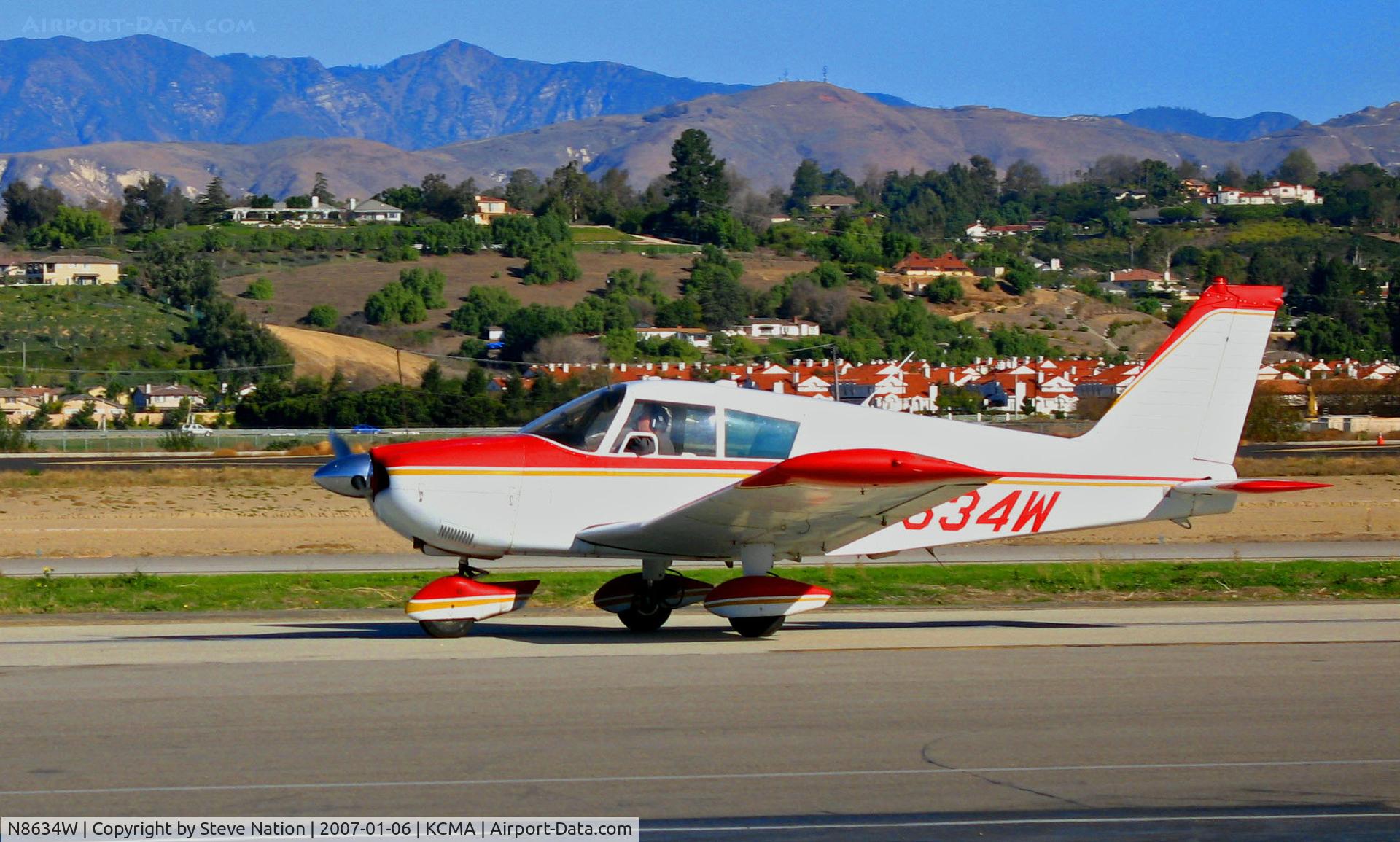 N8634W, 1963 Piper PA-28-235 C/N 28-10149, 1963 Piper PA-28-235 taxis at Camarillo Airport, CA  on sunny, warm Jan day
