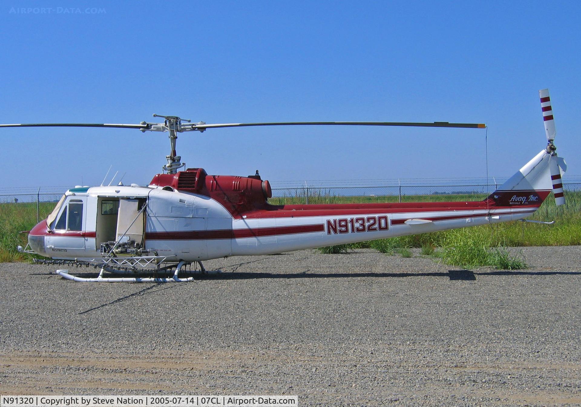 N91320, 1962 Bell UH-1B C/N 62-1887, Avag Inc 1962 Bell UH-1B rigged for spraying at Richvale, CA yard