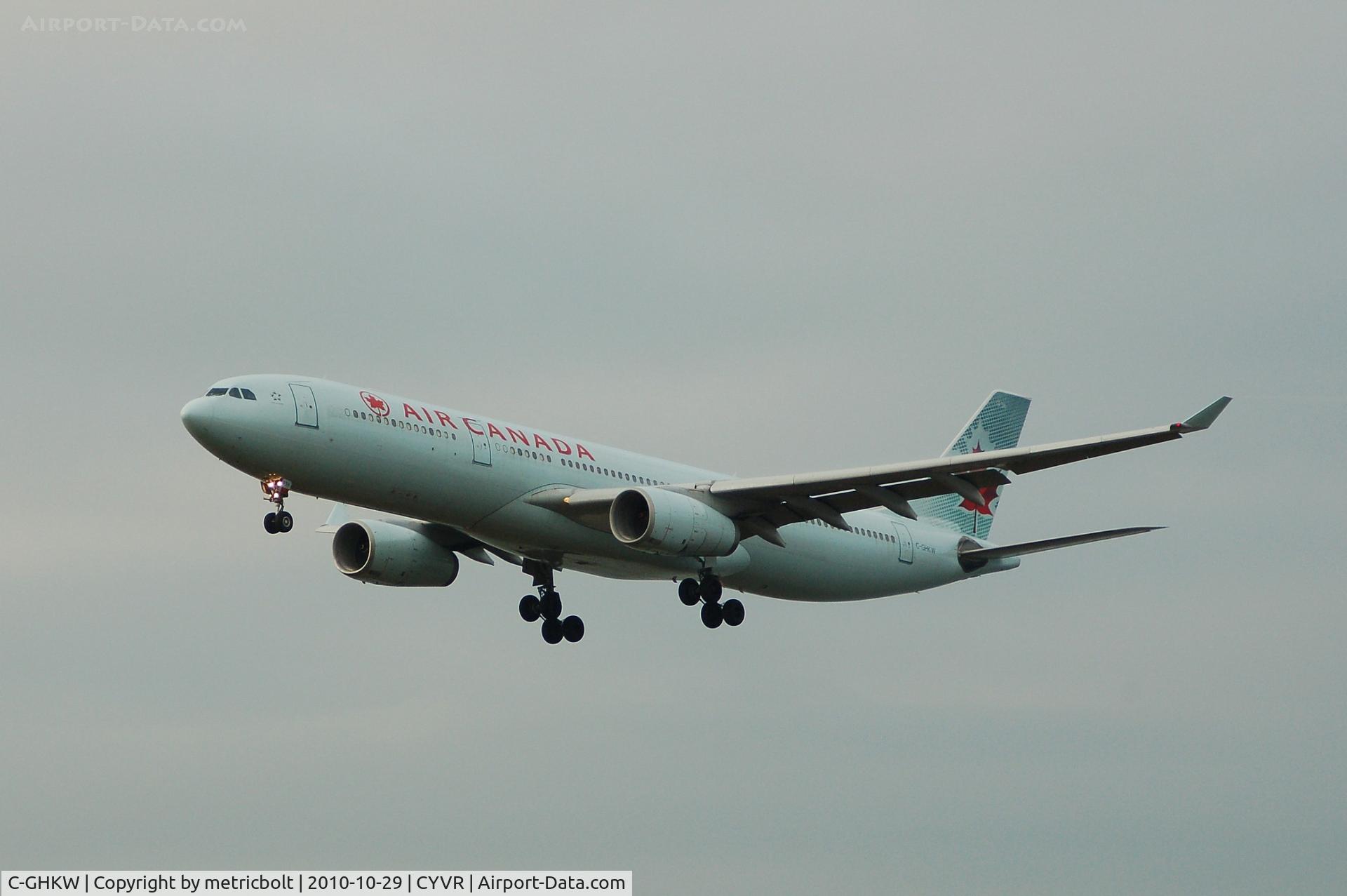C-GHKW, 2001 Airbus A330-343 C/N 0408, Landing on a typical YVR dull,wet day