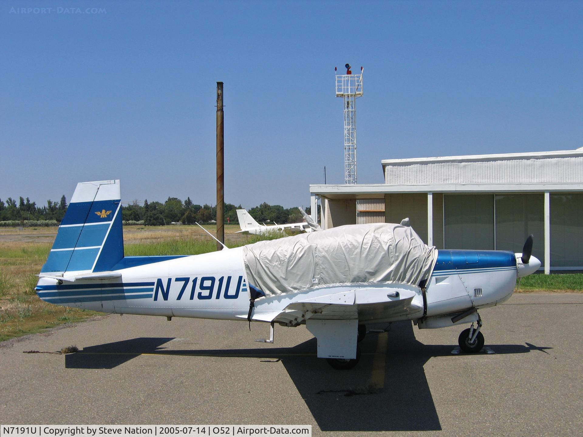 N7191U, 1964 Mooney M20E C/N 409, 1964 Mooney M20E with cover