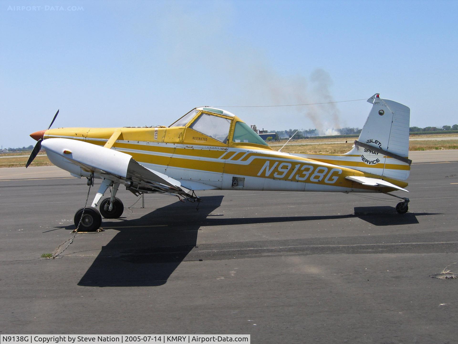 N9138G, 1973 Cessna A188B C/N 18801390, Singleton Spray Service 1973 A188B @ Marysville with rice stubble burning in background
