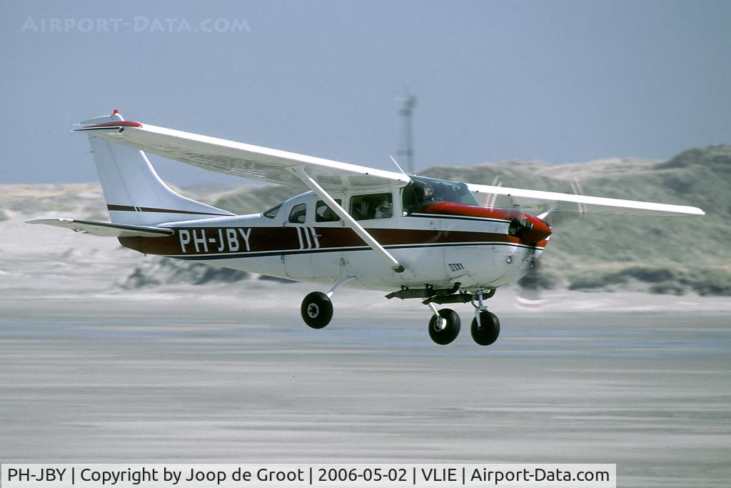 PH-JBY, 1976 Cessna U206F Stationair C/N U20603230, No, not air to air, but passing low at the Vlieland Cornfield armament range control tower.
