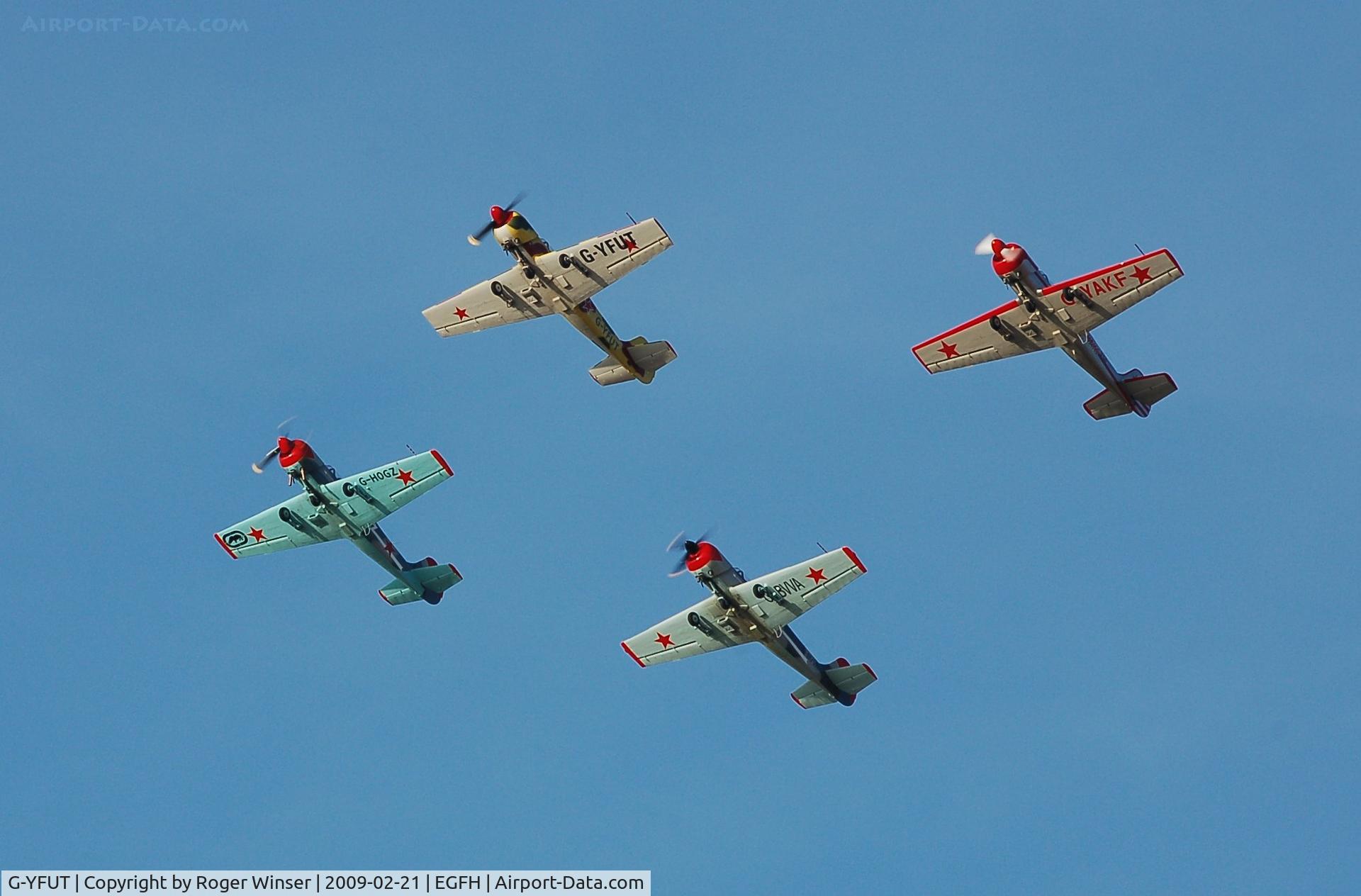 G-YFUT, 1988 Bacau Yak-52 C/N 888410, Leading Team Osprey in 4 ship formation practice