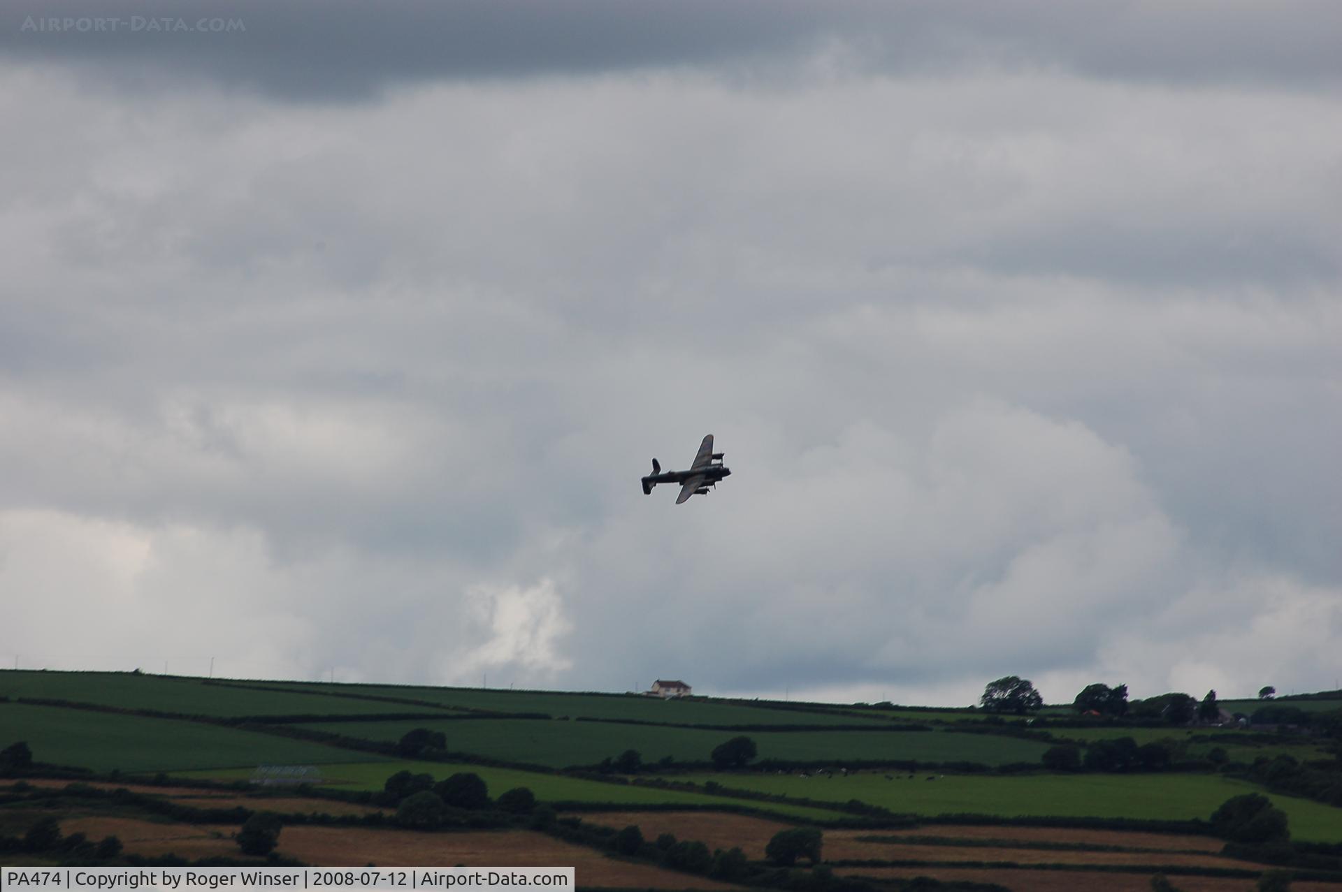 PA474, 1945 Avro 683 Lancaster B1 C/N VACH0052/D2973, Off airport. BBMF's Avro Lancaster B.1 over Kidwelly, Wales, UK during a display at the nearby Kidwelly Carnival.