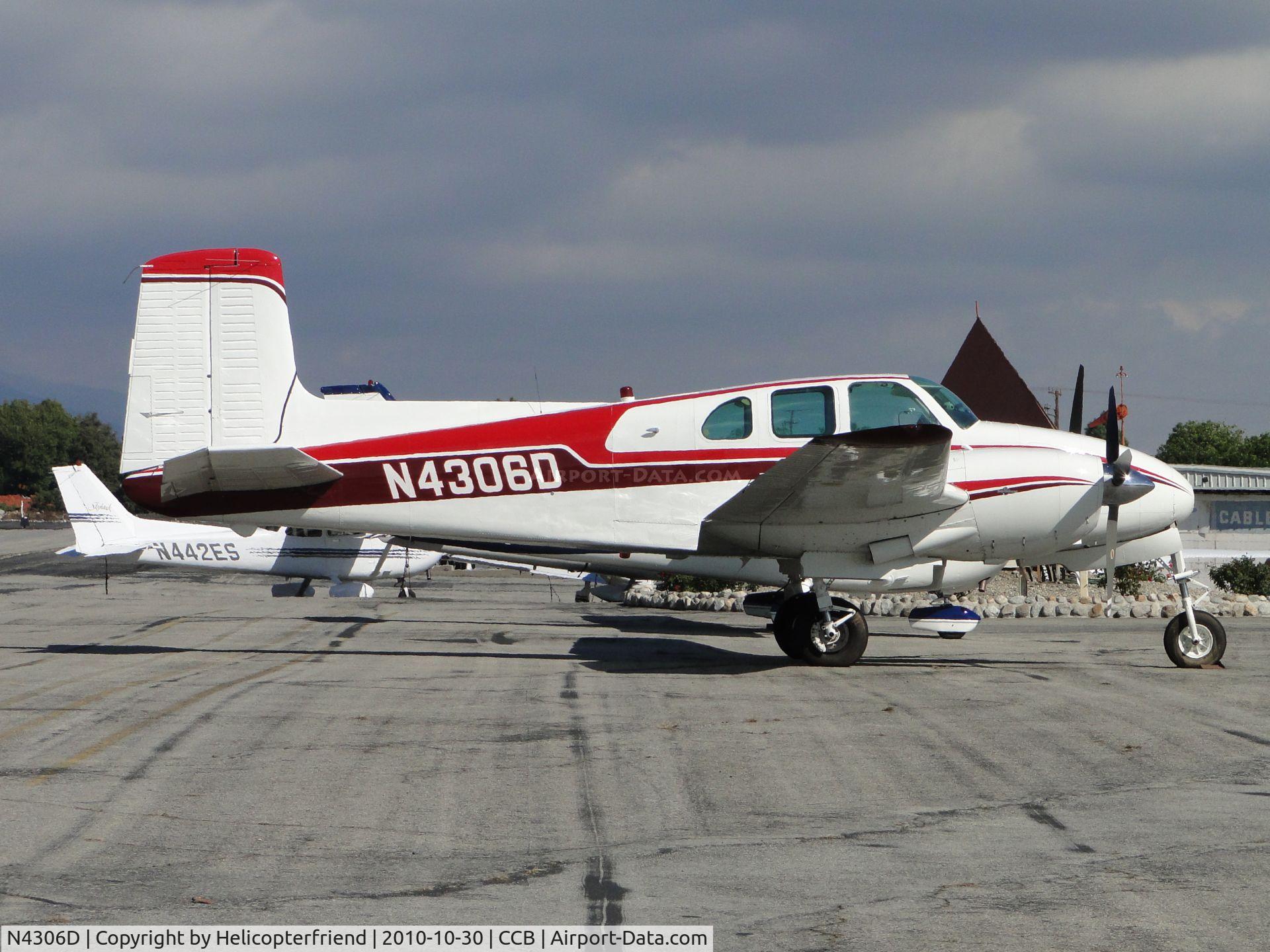N4306D, 1956 Beech D50 Twin Bonanza C/N DH-65, Parked north of Maniac Mike's Cafe