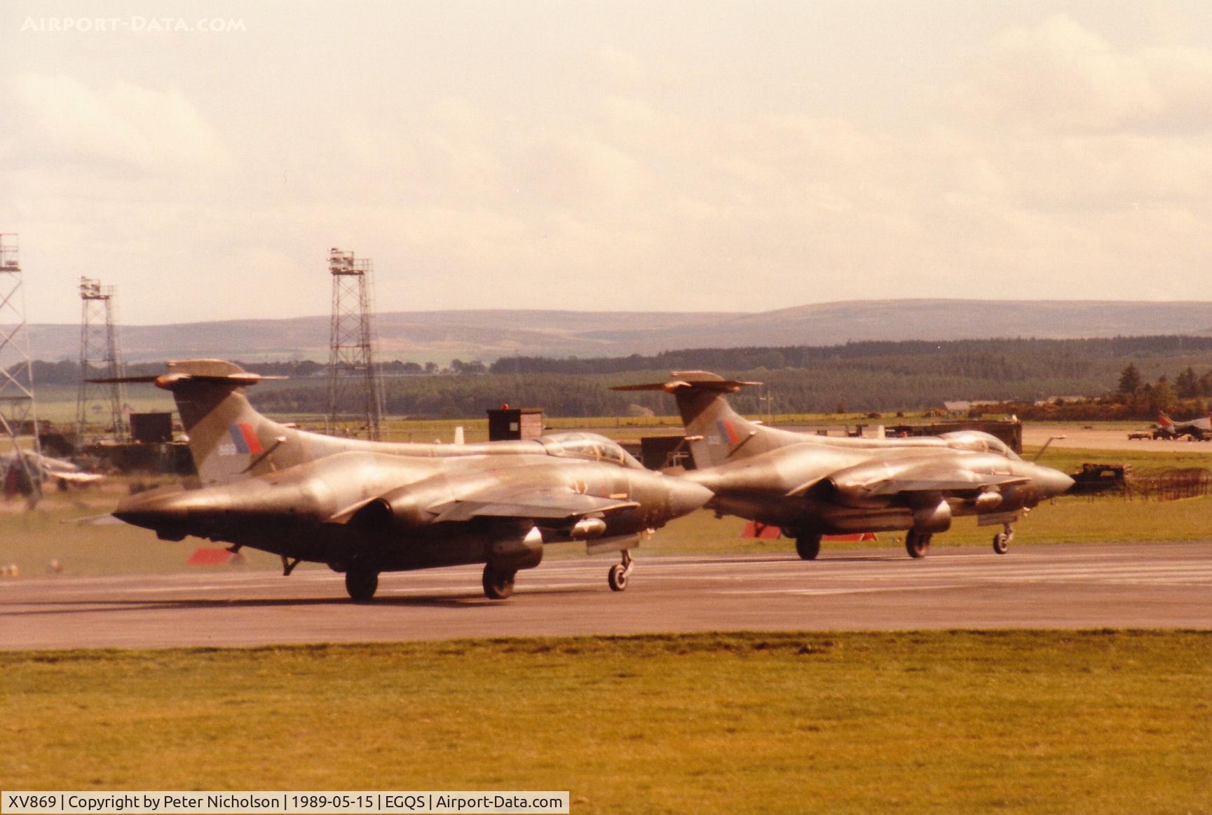 XV869, 1969 Hawker Siddeley Buccaneer S.2B C/N B3-01-68, Buccaneer S.2B of 12 Squadron but operating at the time with 237 Operational Conversion Unit preparing to take-off with XV332 at RAF Lossiemouth in May 1989.
