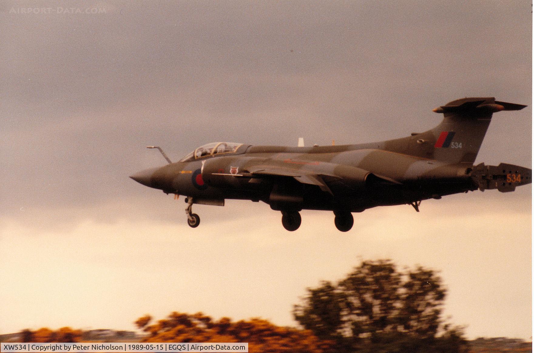 XW534, 1971 Hawker Siddeley Buccaneer S.2B C/N B3-03-70, Buccaneer S.2B of 12 Squadron crossing the boundary fence onto Runway 23 at RAF Lossiemouth in May 1989.